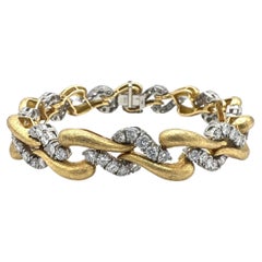 Bracelet français vintage en platine, or jaune et diamants