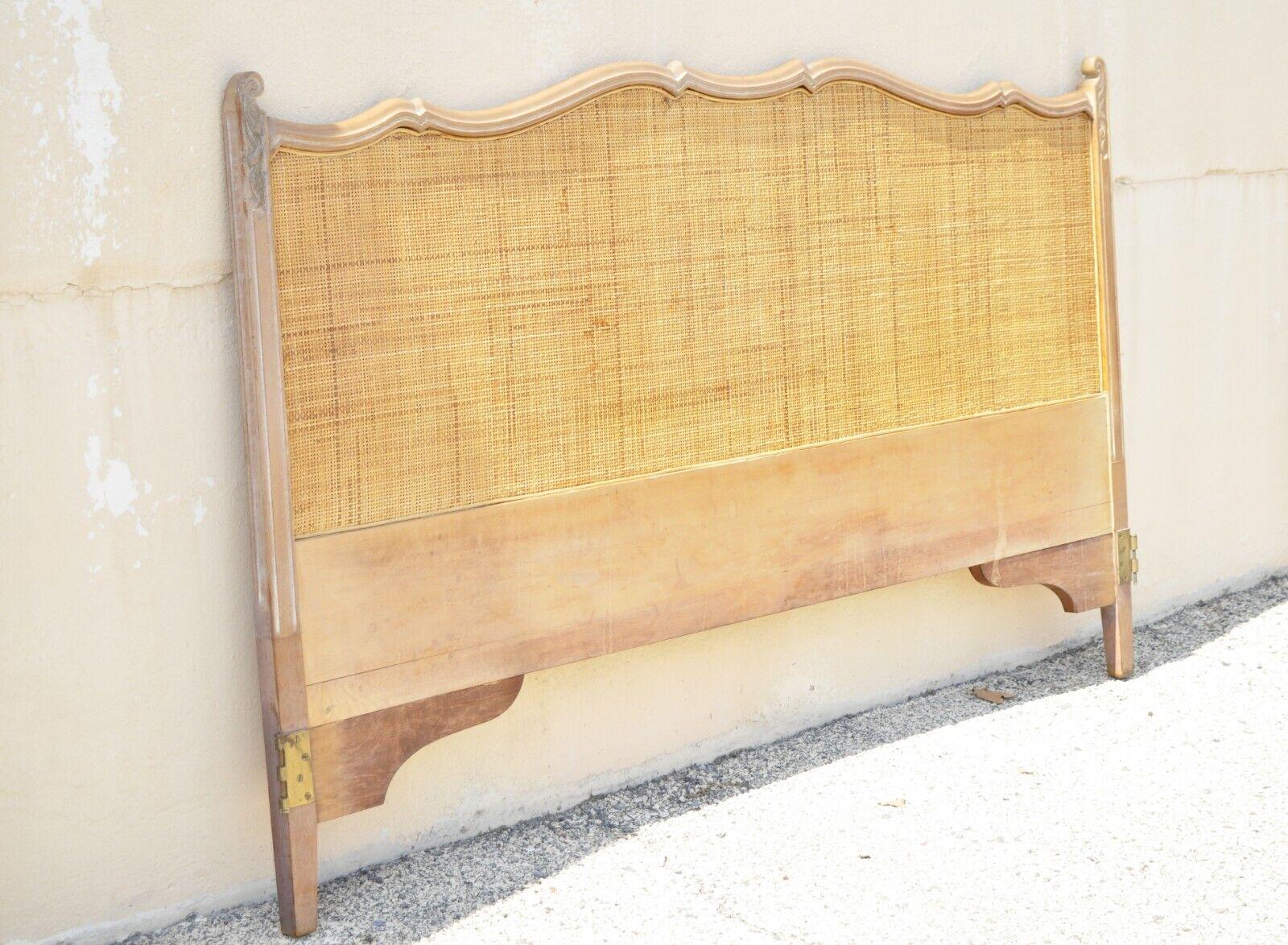 Vintage French provincial cane panel carved wood king size bed headboard. Item features a cane central panel, white washed finish, solid wood frame, beautiful wood grain, distressed finish, very nice vintage item, quality American craftsmanship.