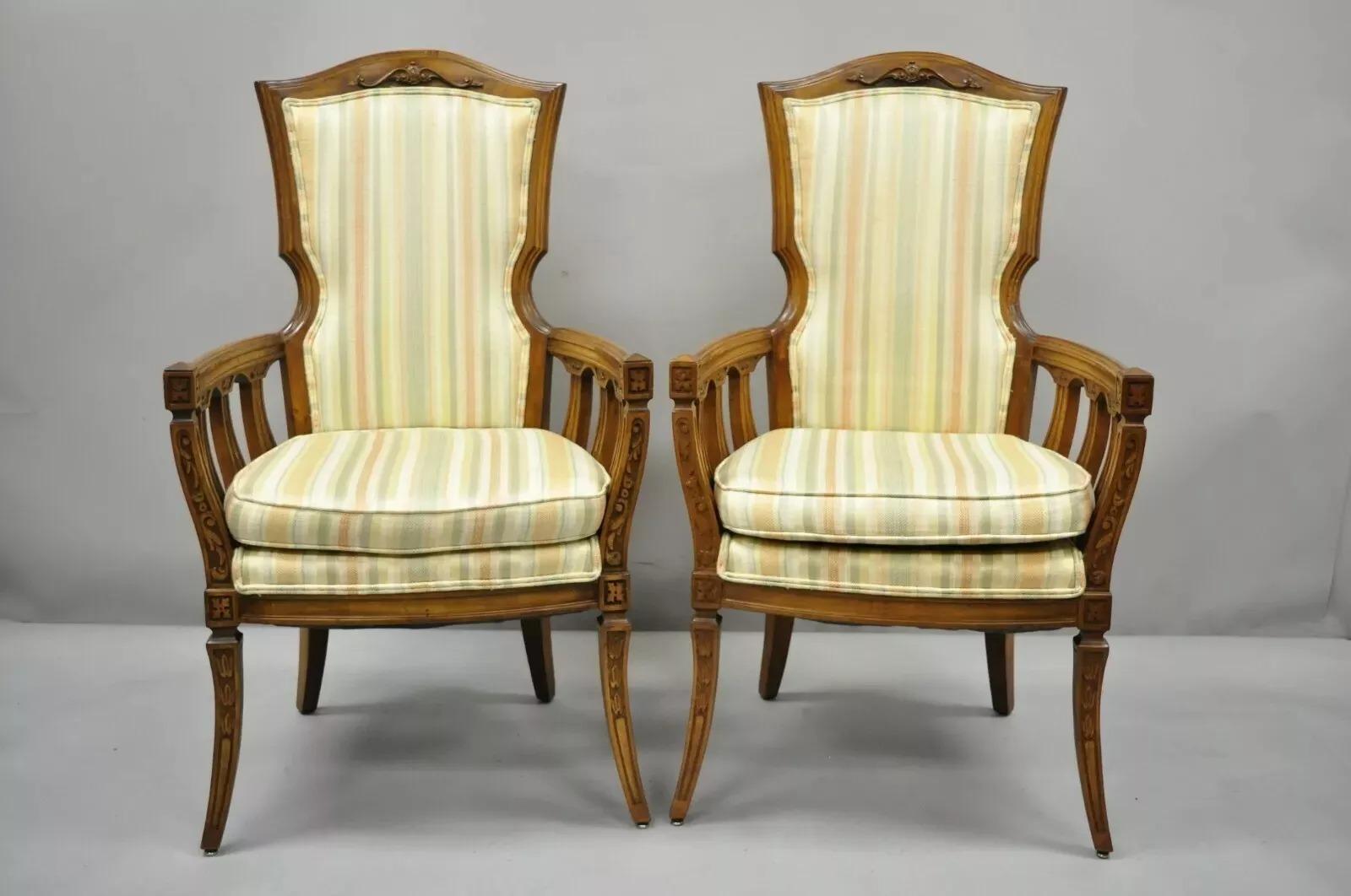 Pair of Vintage French Provincial Hollywood Regency Tall Back Lounge Arm Chairs. Item features tall comfortable backs, solid wood frame, nicely carved details, tapered legs, great style and form. Circa Mid 20th Century. Measurements: 44.5