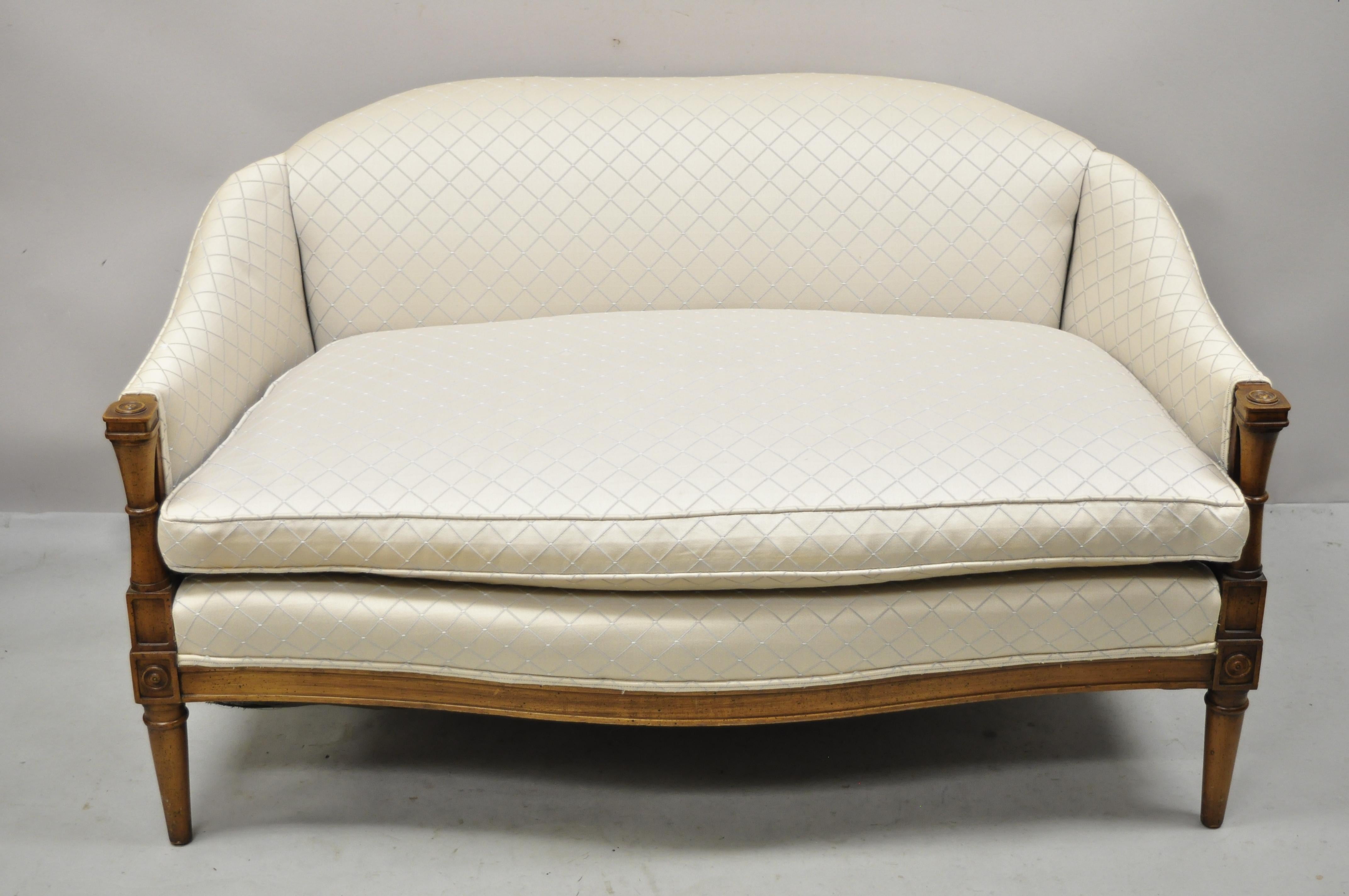 Vintage French Provincial Hollywood Regency upholstered settee loveseat sofa. Item features solid wood frame, distressed finish, nicely carved details, tapered legs, very nice vintage item, quality American craftsmanship, great style and form. Circa
