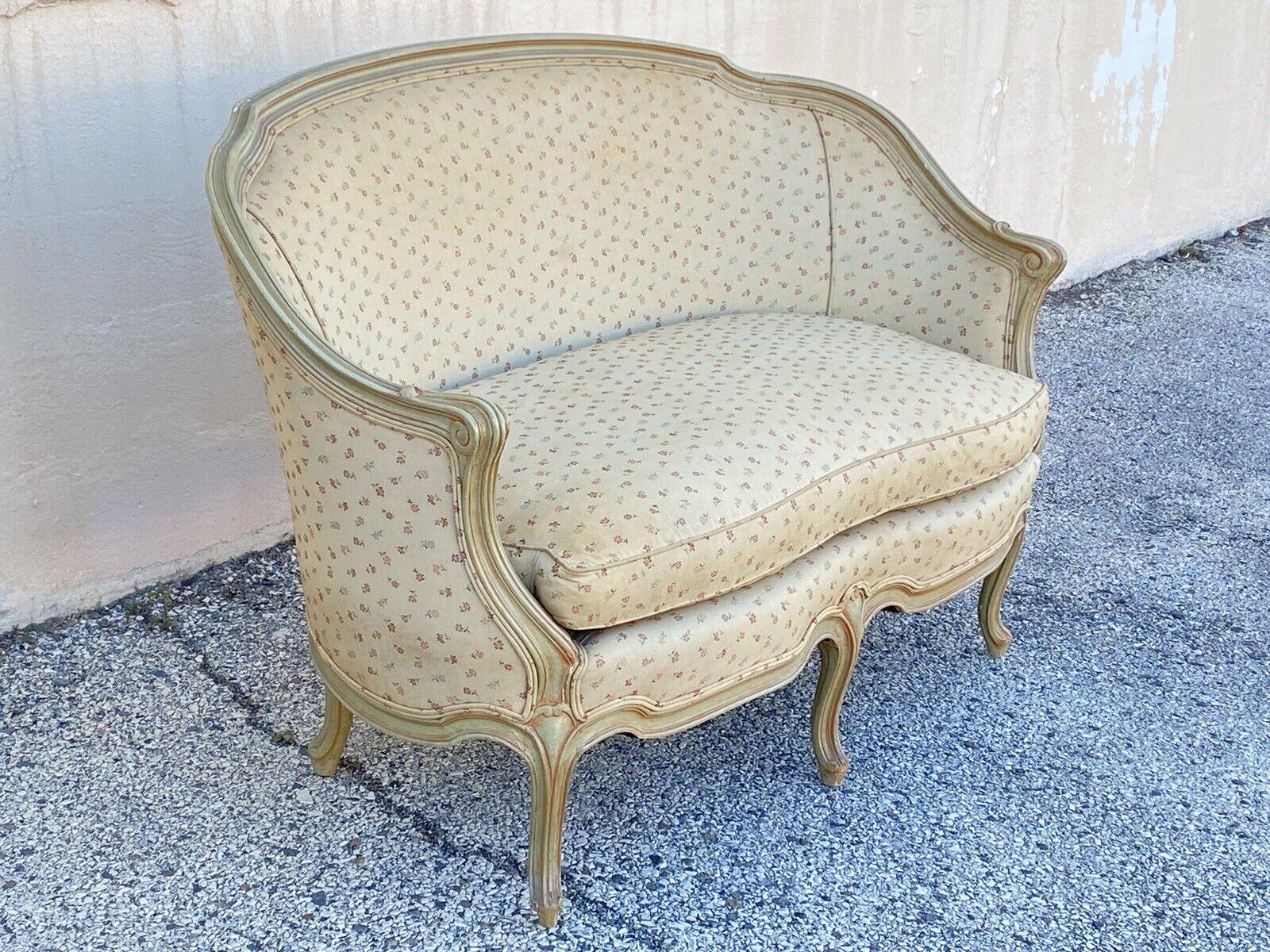 Vintage French Provincial Louis XV Style Green Pink Barrel Back Loveseat Settee. Item features a solid wood barrel back frame, distressed green and pink painted finish, cabriole legs, very nice vintage item, great style and form. Circa Mid 20th