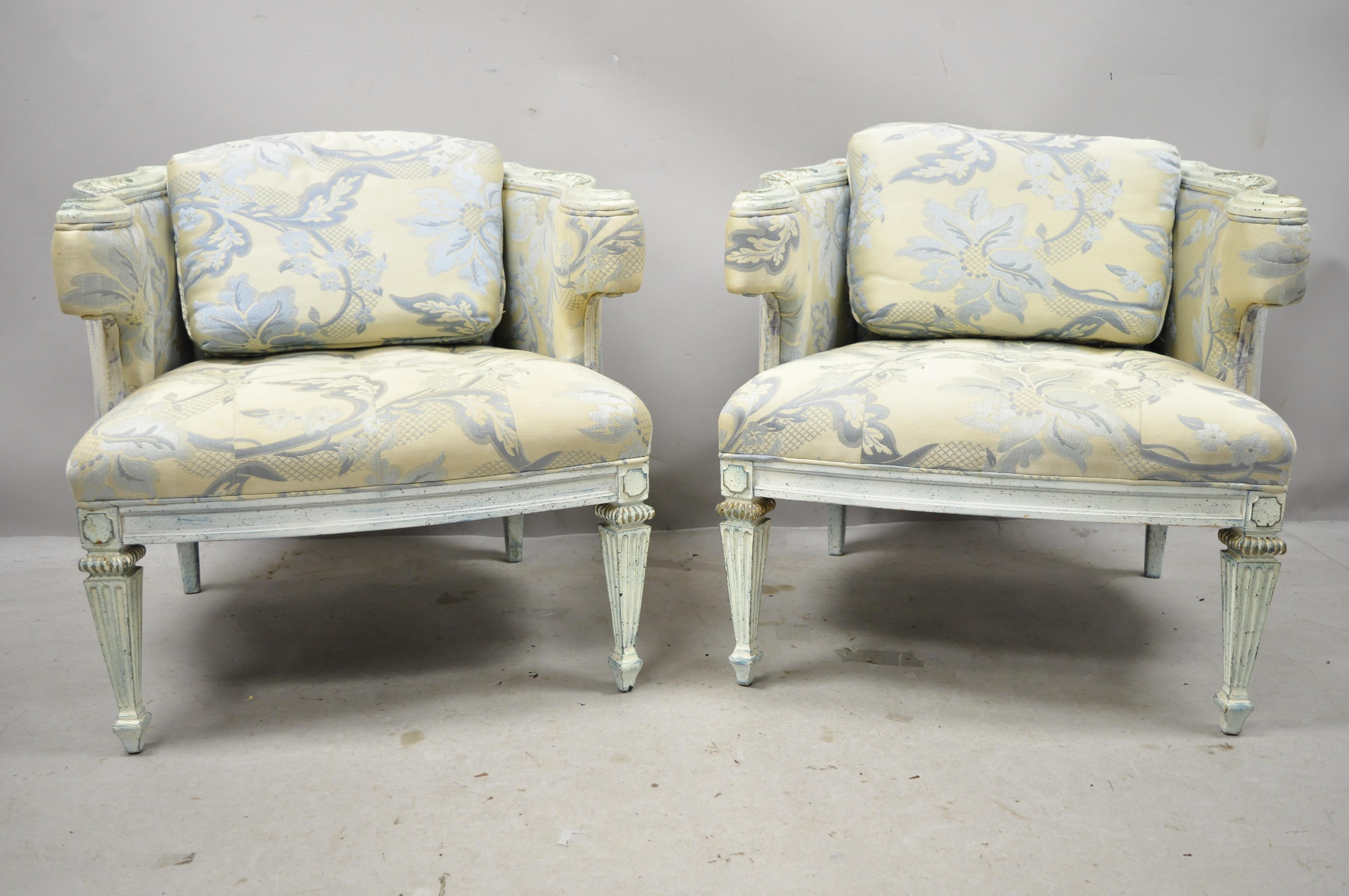 Vintage French Provincial Louis XVI blue and cream painted lounge club chairs - a pair. Item features solid wood frame, blue distressed finish, tapered legs, great style and form, circa mid-20th century. Measurements: 25