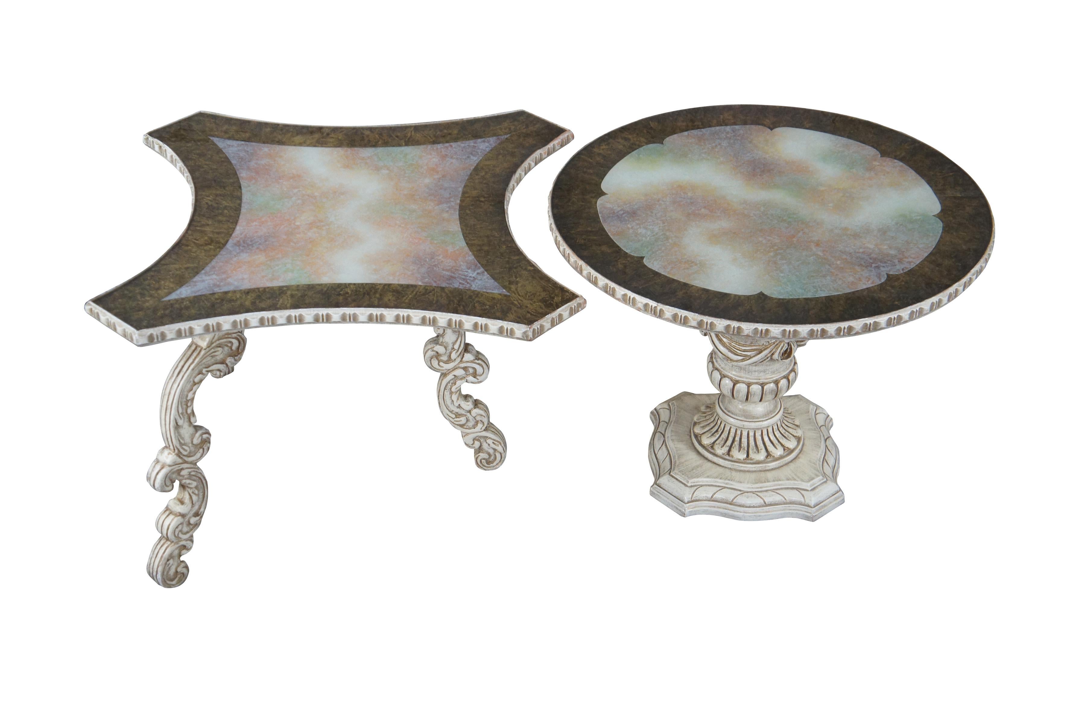 A fun set of provincial tables, circa 1970s. One is round with a pedestal base and the other has a contoured square form with three legs. Features glass inset tops with an iridescent rainbowed center framed in gold. Each has a carved leg or base and