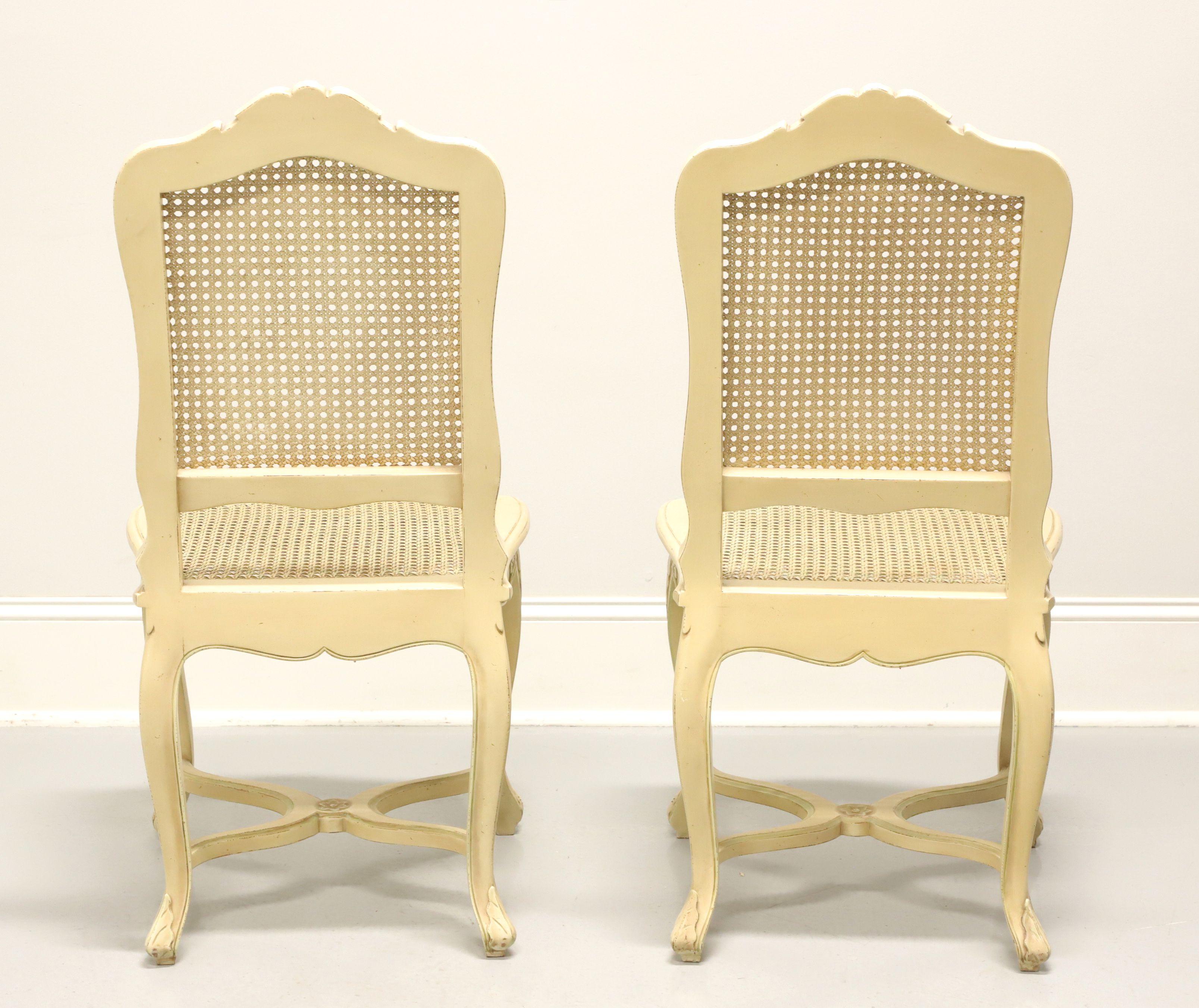 20th Century Vintage French Provincial Painted Caned Dining Side Chairs - Pair