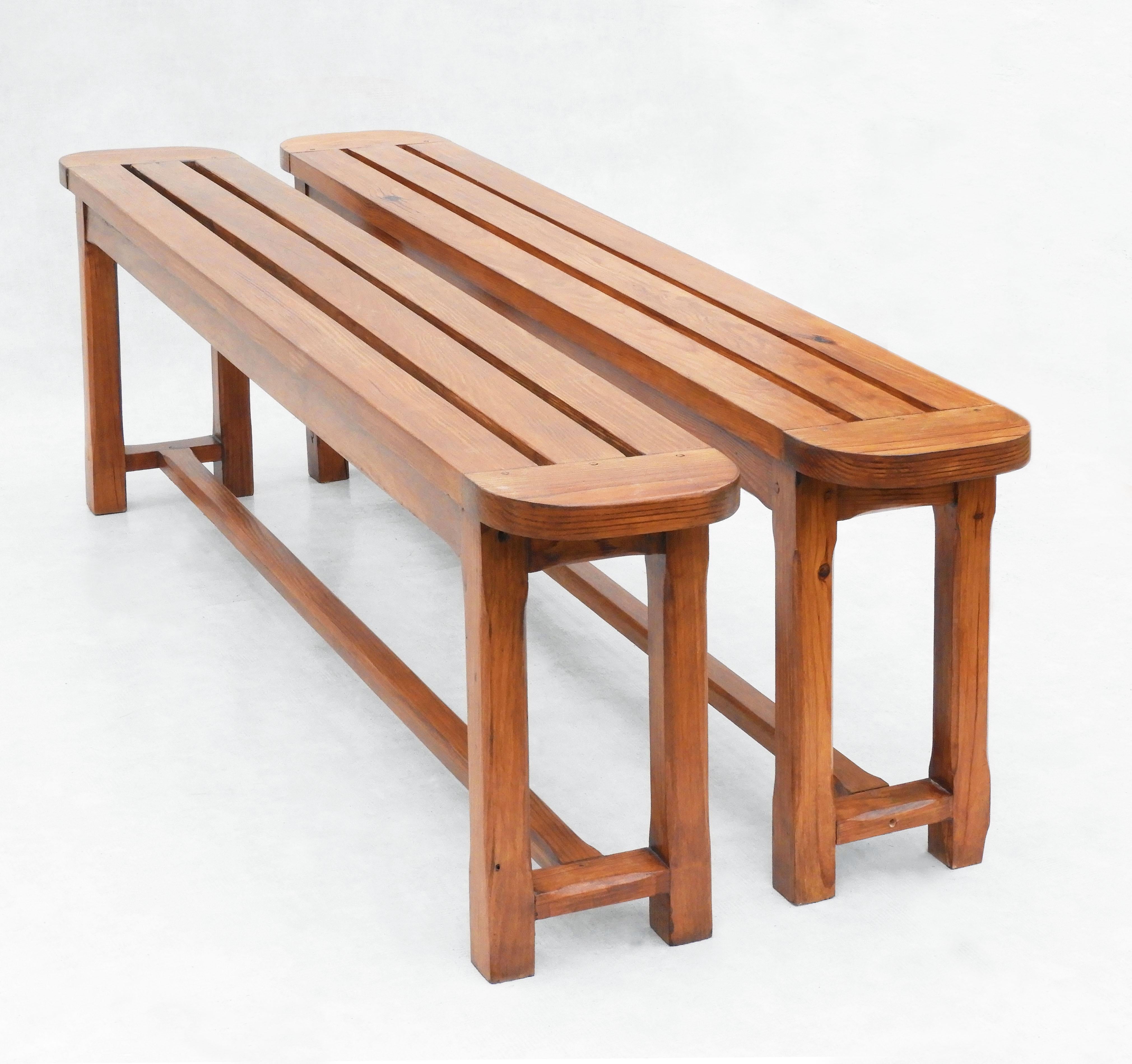 French Provincial pine benches from the South West region of France C1980.
These simple but stylish, artisan-made wooden 'bancs' sit easily in almost any setting. At over five feet long they sit three people comfortably.  Great for either side of a
