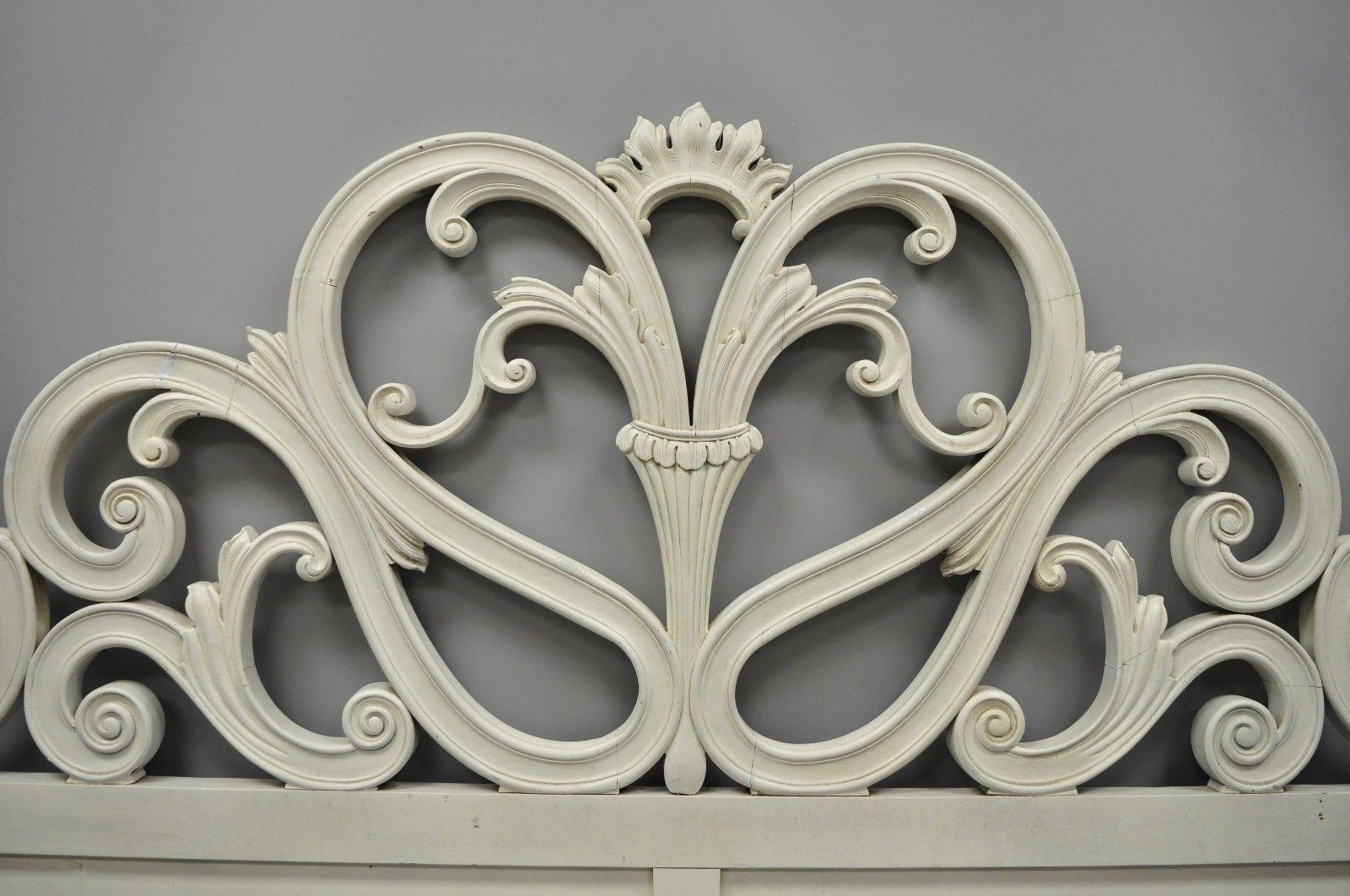 Vintage French Provincial / Rococo carved wood king-size bed headboard. Item features fancy scroll work, white finish, solid wood construction, and great style and form, circa mid-20th century. Measurements: 54
