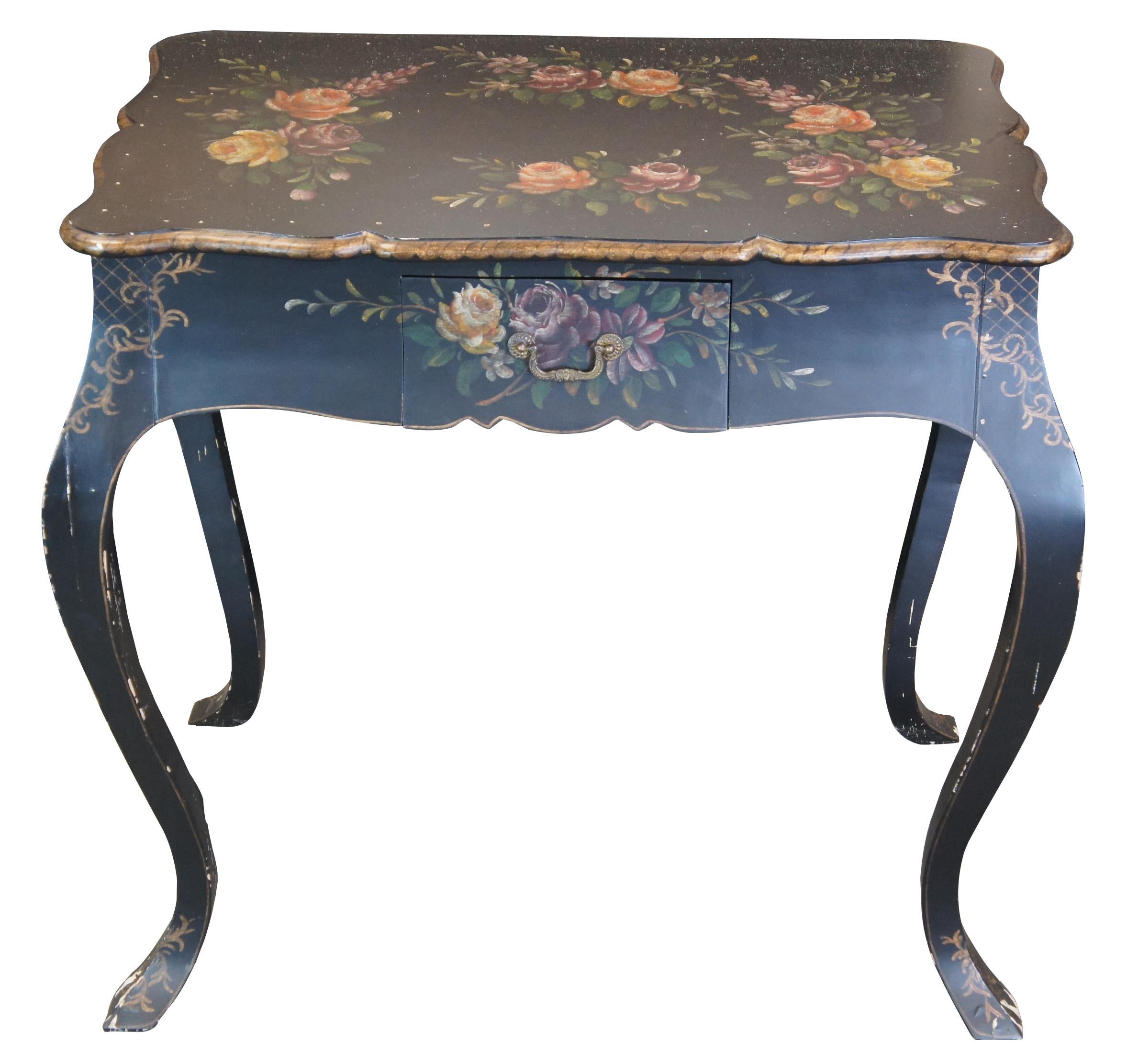 Vintage French Provincial Rococo entry console table featuring hand painted floral designs over black or ebony finish with elaborate serpentine and scalloped form and one storage drawer.

Measures: 24.5