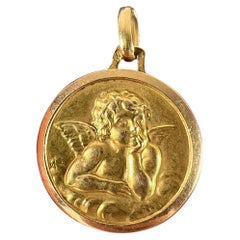 Ciondolo Medaglia d'epoca Raphael French con Cherubino in oro giallo 18 carati