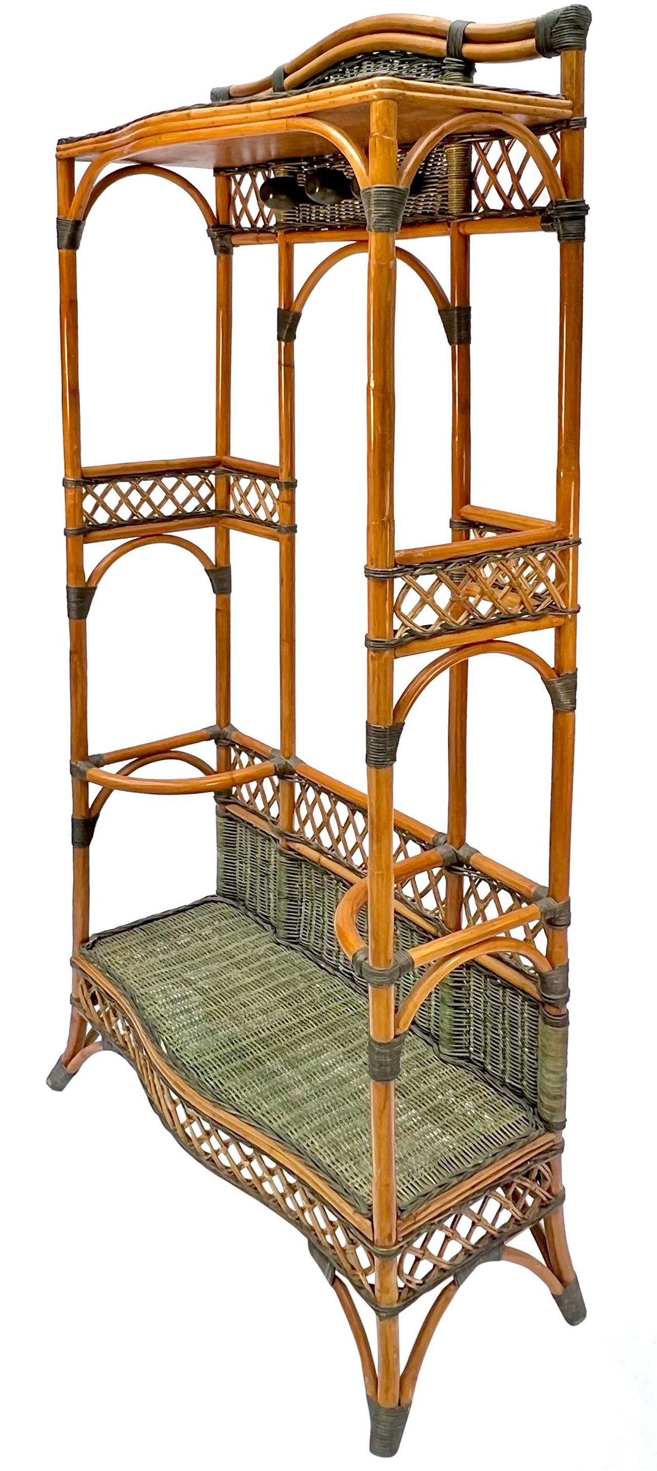 Vintage French rattan coat hat rack hall stand with Umbrella holders

Offered for sale is a circa 1980s French rattan hall stand with two-tone rattan. The hall stand has coat and hat hooks plus umbrella holders on either side. This is a great