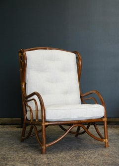 Tumbona francesa vintage de ratán con cojines acolchados, años 60