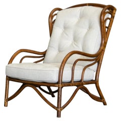 Tumbona francesa vintage de ratán con cojines acolchados, años 60