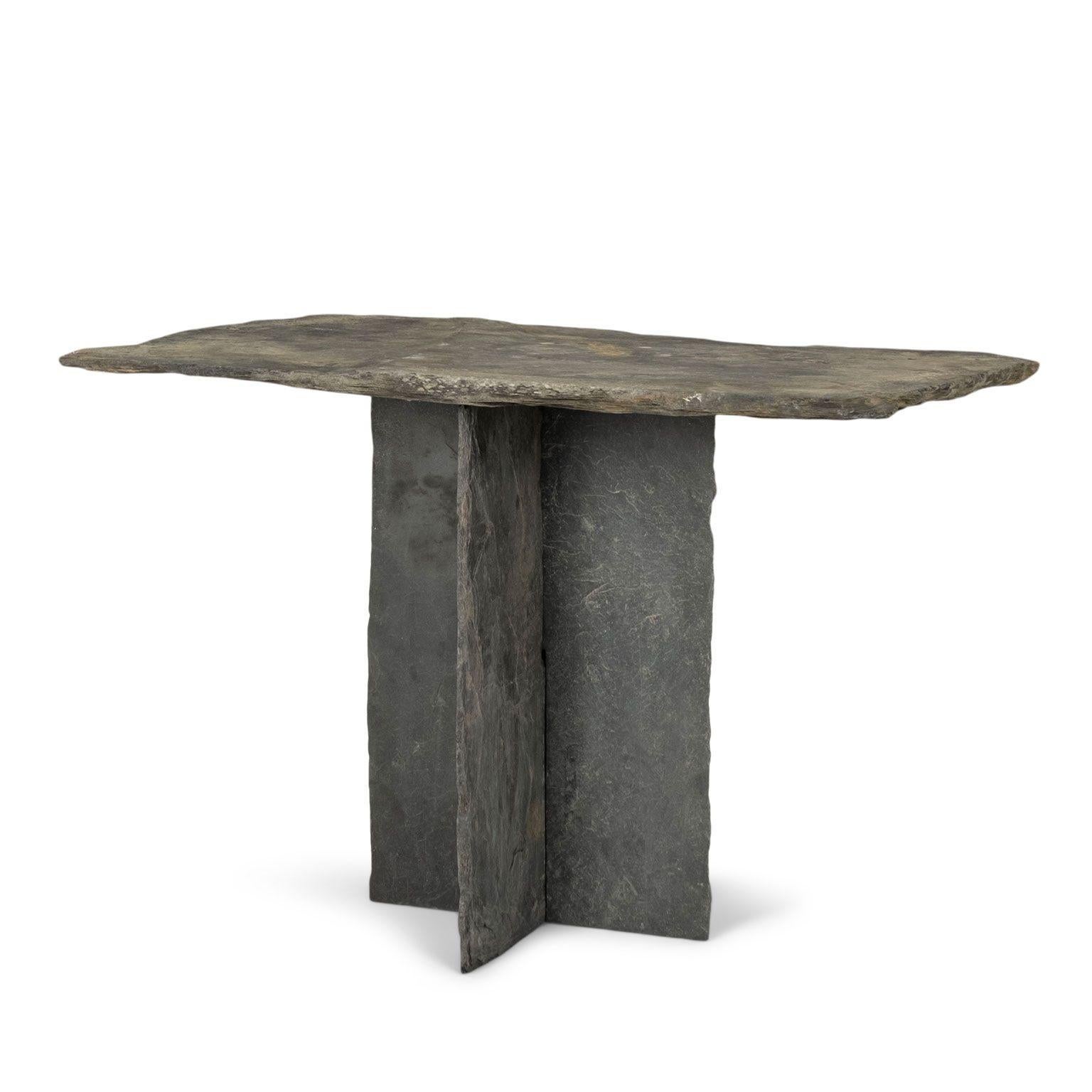 Vintage French rectangular top slate table, raised upon two-piece straight-edge slate base. Another similar table in slightly different dimensions is available. Tables sold individually, priced $9,600 each.
Patina from outdoor use for decades can be