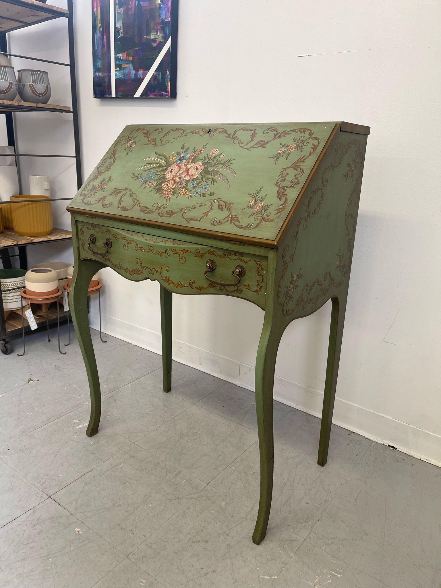 This piece has original hardware on a single dovetailed drawer. Curved wood to the front two legs. Finished backing as shown. Chair with similar motif is included as a set. Vintage Condition Consistent with Age as Pictured.

Dimensions. 27 W ; 17 D