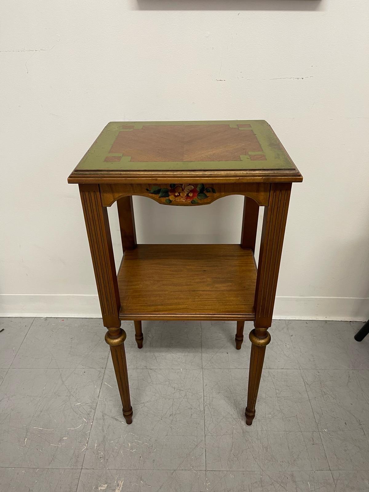 This Table has Painted Floral Accents and Green Painted Top. Beautiful Petina Shows Age.?Turned Wood Legs. Vintage Condition Consistent with Age as Pictured.

Dimensions. 15 W ; 13 D ; 29 H