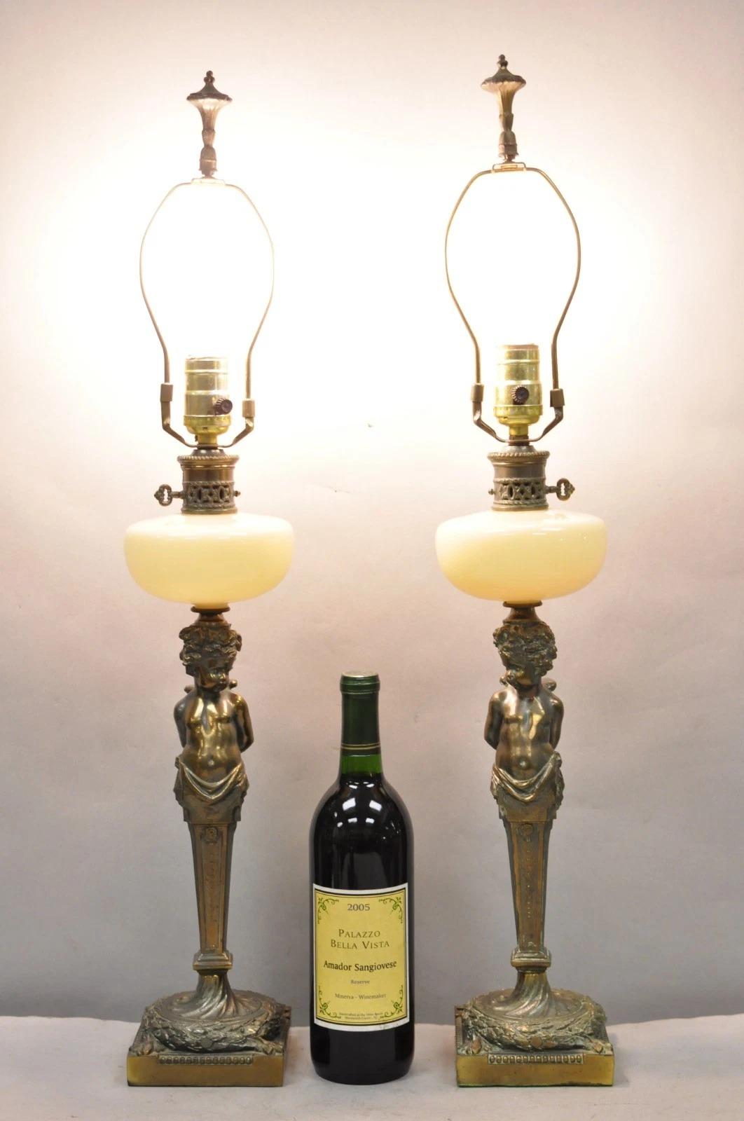 Vintage French Renaissance Revival Brass Figural Cherub Putti Column Cream Glass Table Lamps - a Pair. Circa Early 20th Century. Measurements: 28.5