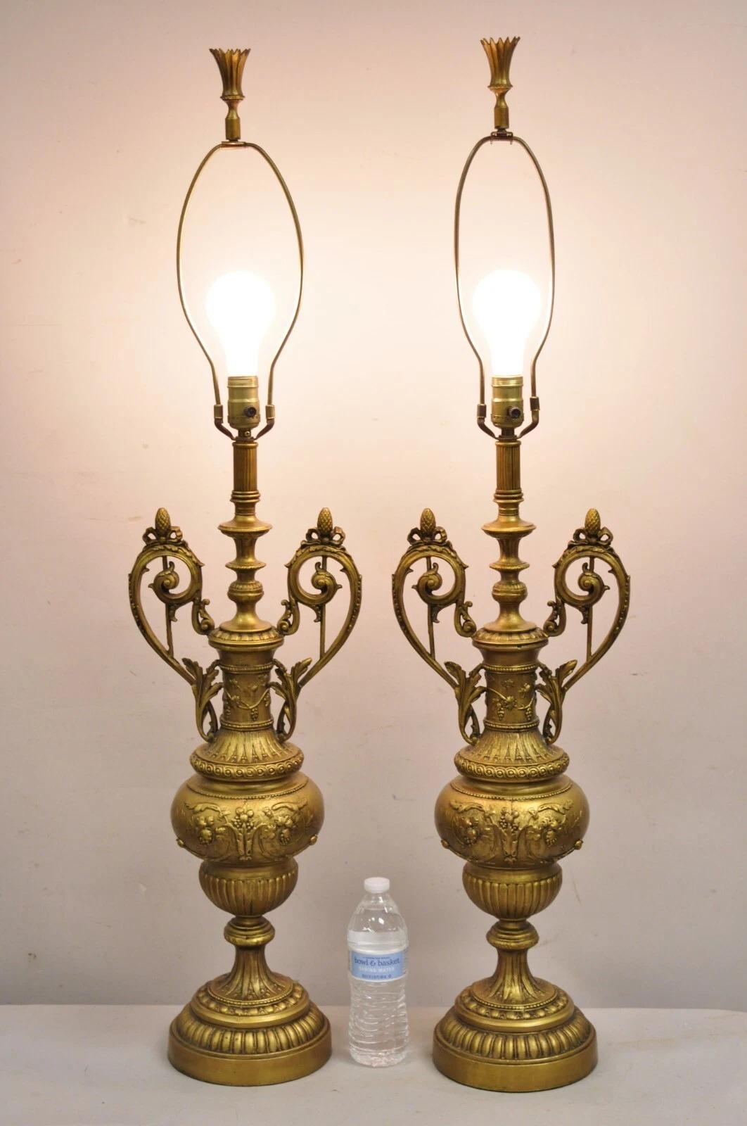 Vintage French Renaissance Louis XV Style Gold Gilt Metal Tall Twin Handle Ornate Table Lamps - a Pair. Circa Mid 20th Century. Measurements: 42.5