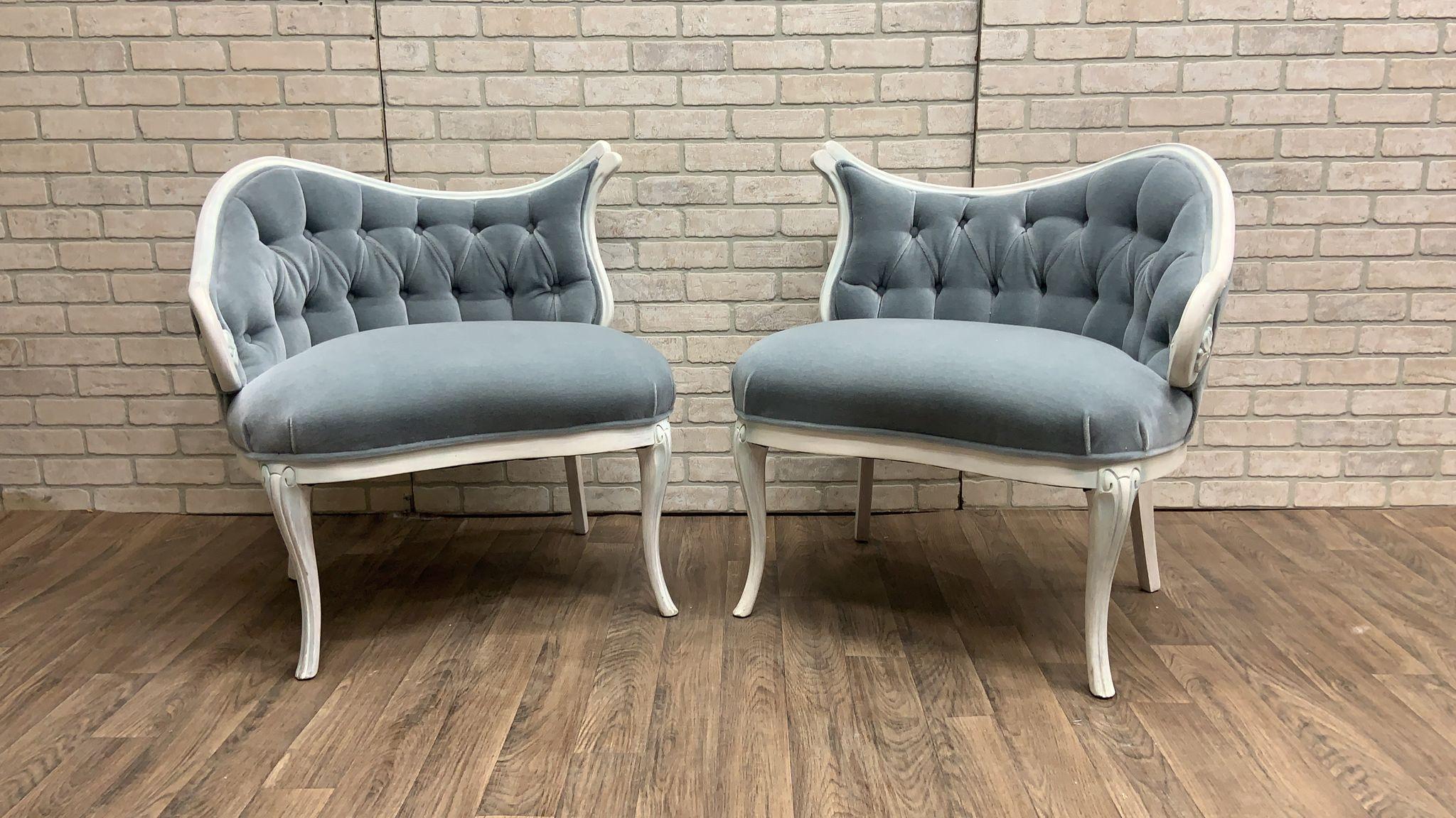 Vintage French Rococo Style Asymmetrical Fireside Chairs Newly Upholstered in Ice Blue Mohair - Pair

The 1940 vintage pair of French Rococo style asymmetrical fireside chairs exude elegance with their classic design. These chairs showcasing the