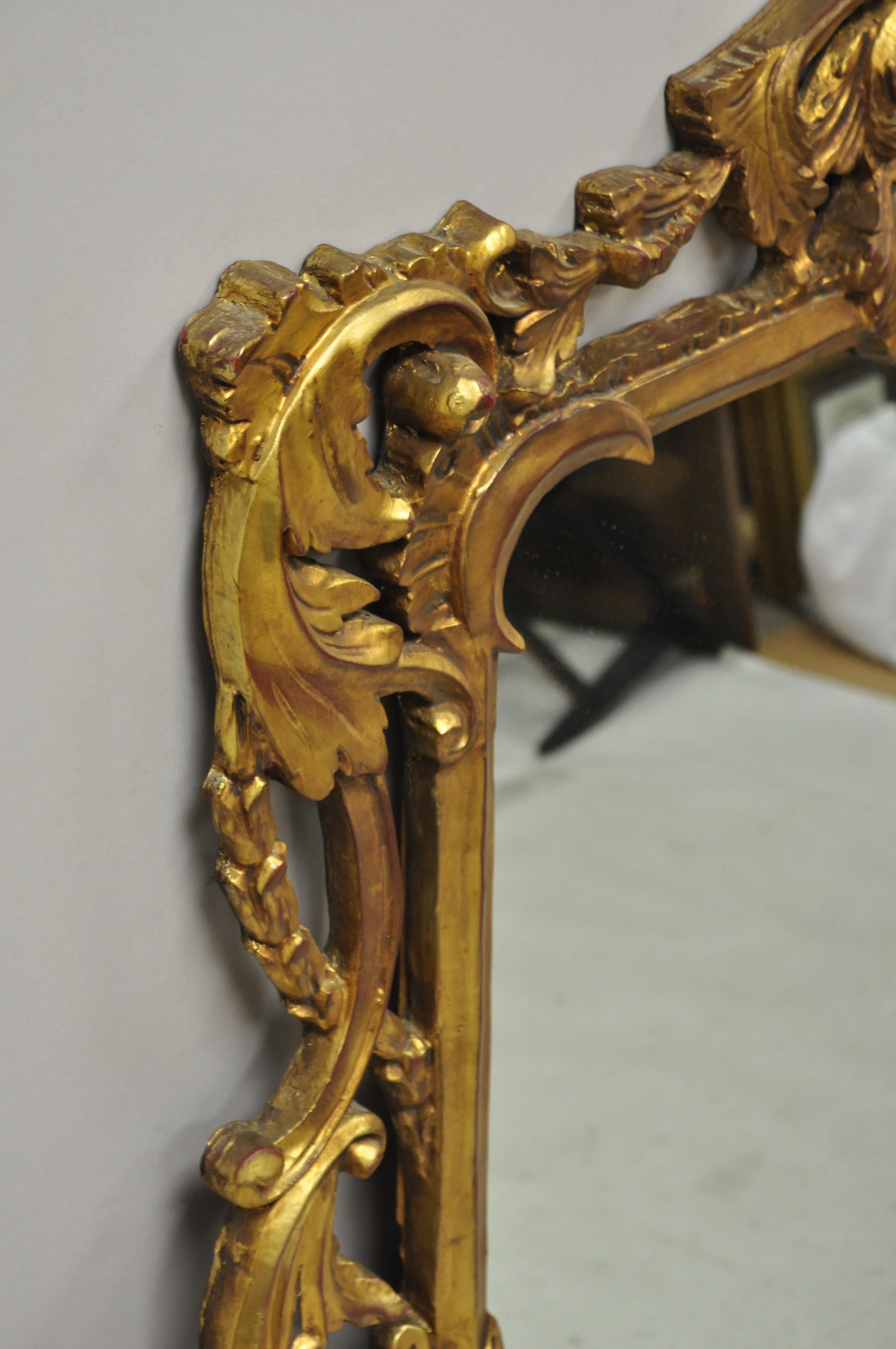 Vintage French Rococo Style Gold Ornate Pierce Carved Frame Wall Mirror In Good Condition In Philadelphia, PA
