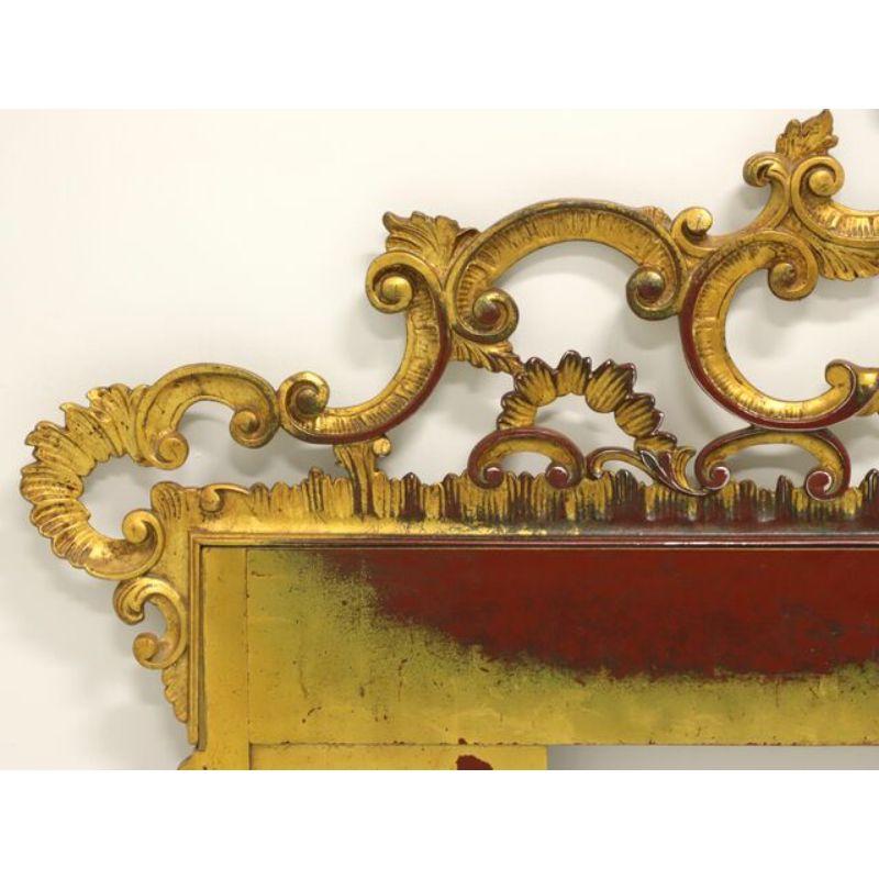 A French Rococo style king size headboard, unbranded. Solid metal with antiqued gold finish with some tones of red and black. Features an exuberant use of curving forms lending elegance. Possibly made in the USA, in the mid 20th century.

Measures: