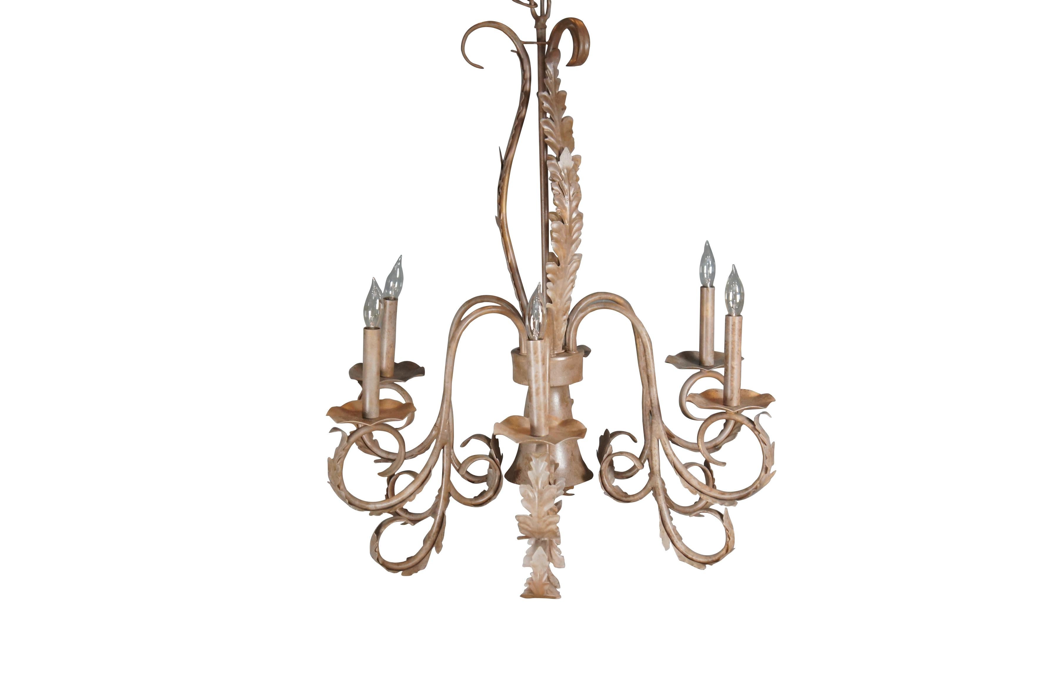 Vintage French Acanthus scrolled iron chandelier featuring 6 arm design with down light.  The down light can be operated in conjunction with the other lights or by itself.

Dimensions:
27