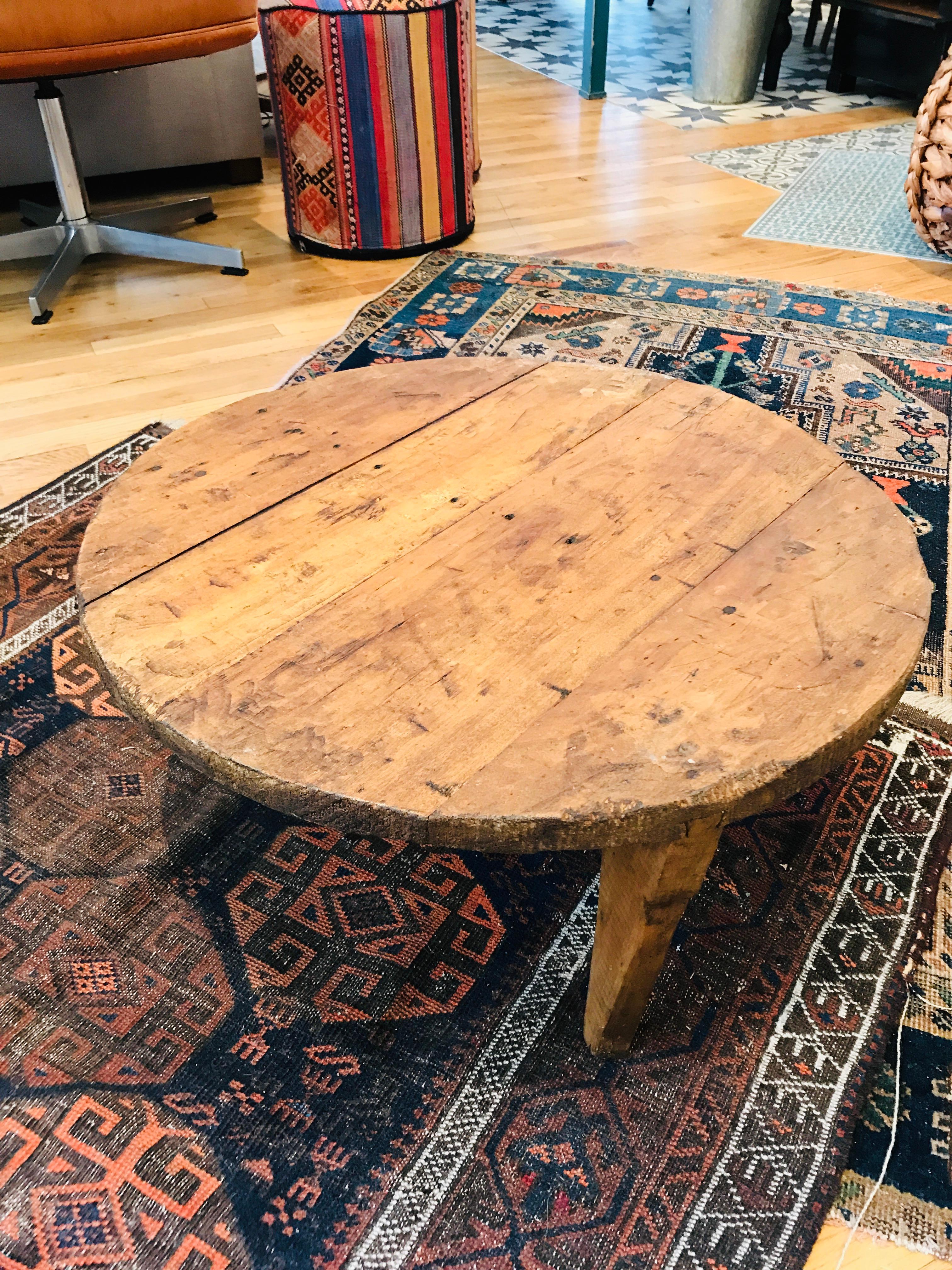 A low sitting vintage French side table with natural oak exposed. Perfect for a effortless, relaxed and earthy setting. This side table will compliment any bohemian seating area.