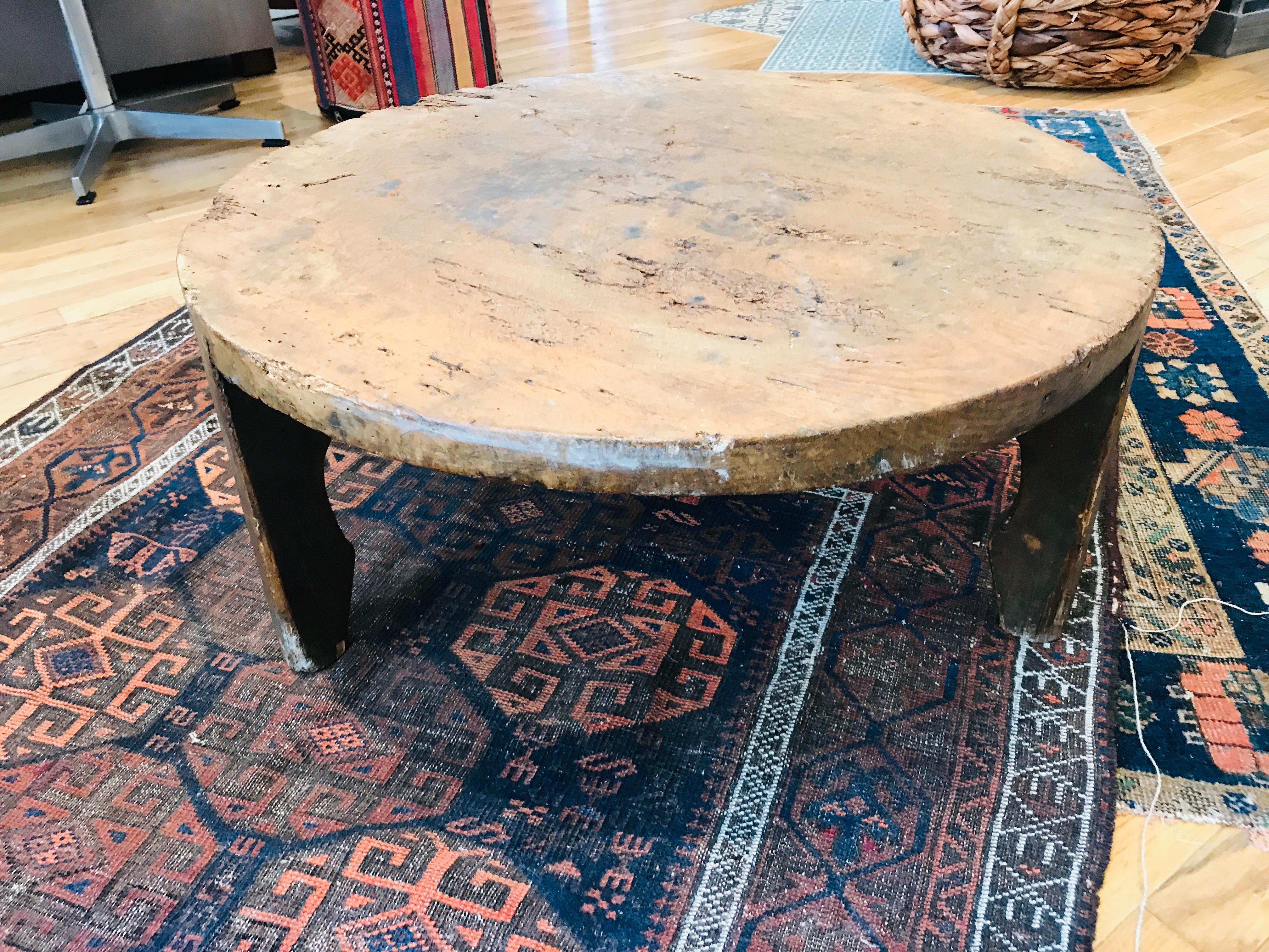 A low sitting vintage French side table with natural oak exposed. Perfect for a effortless, relaxed and earthy setting. This side table will compliment any bohemian seating area.
