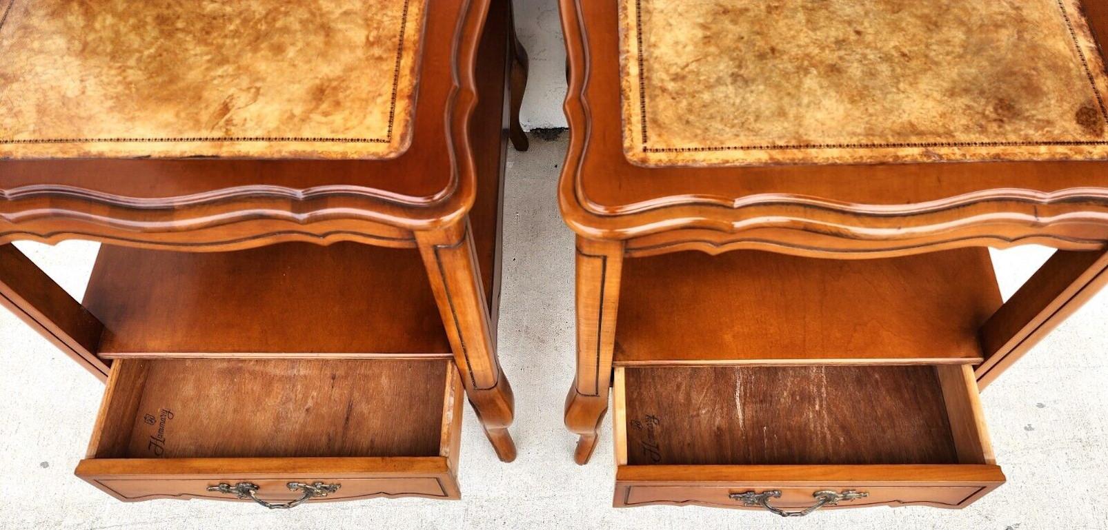 For FULL item description click on CONTINUE READING at the bottom of this page.

Offering One Of Our Recent Palm Beach Estate Fine Furniture Acquisitions Of A
Pair of Vintage French Provincial Side Tables Walnut Leather Top by HAMMARY

Approximate