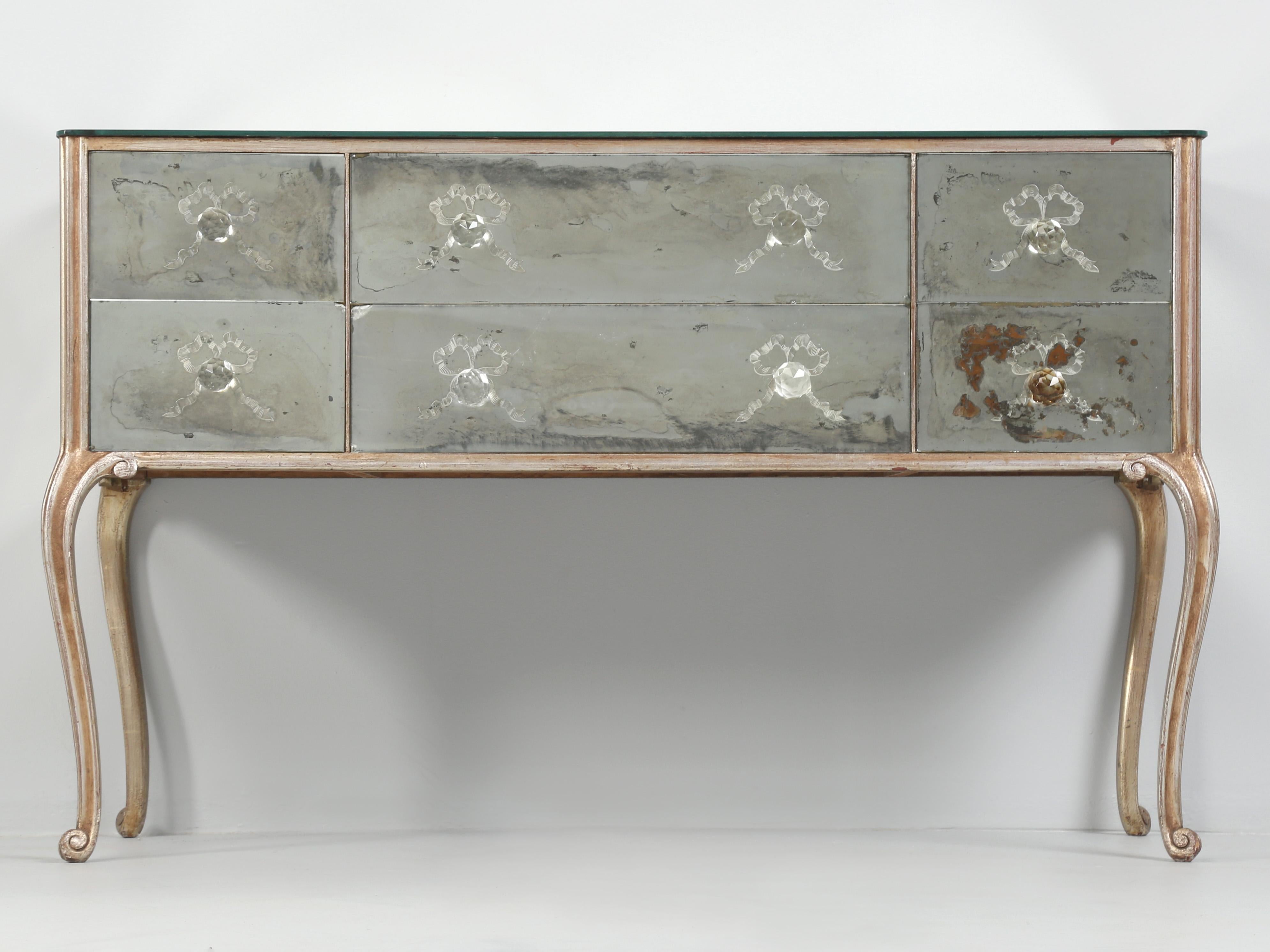 During the past few decades, we have had many mirrored pieces of furniture and I always found it difficult to determine if the mirrored furniture was French, Italian or American. This particular mirrored chest appears to be vintage from the late