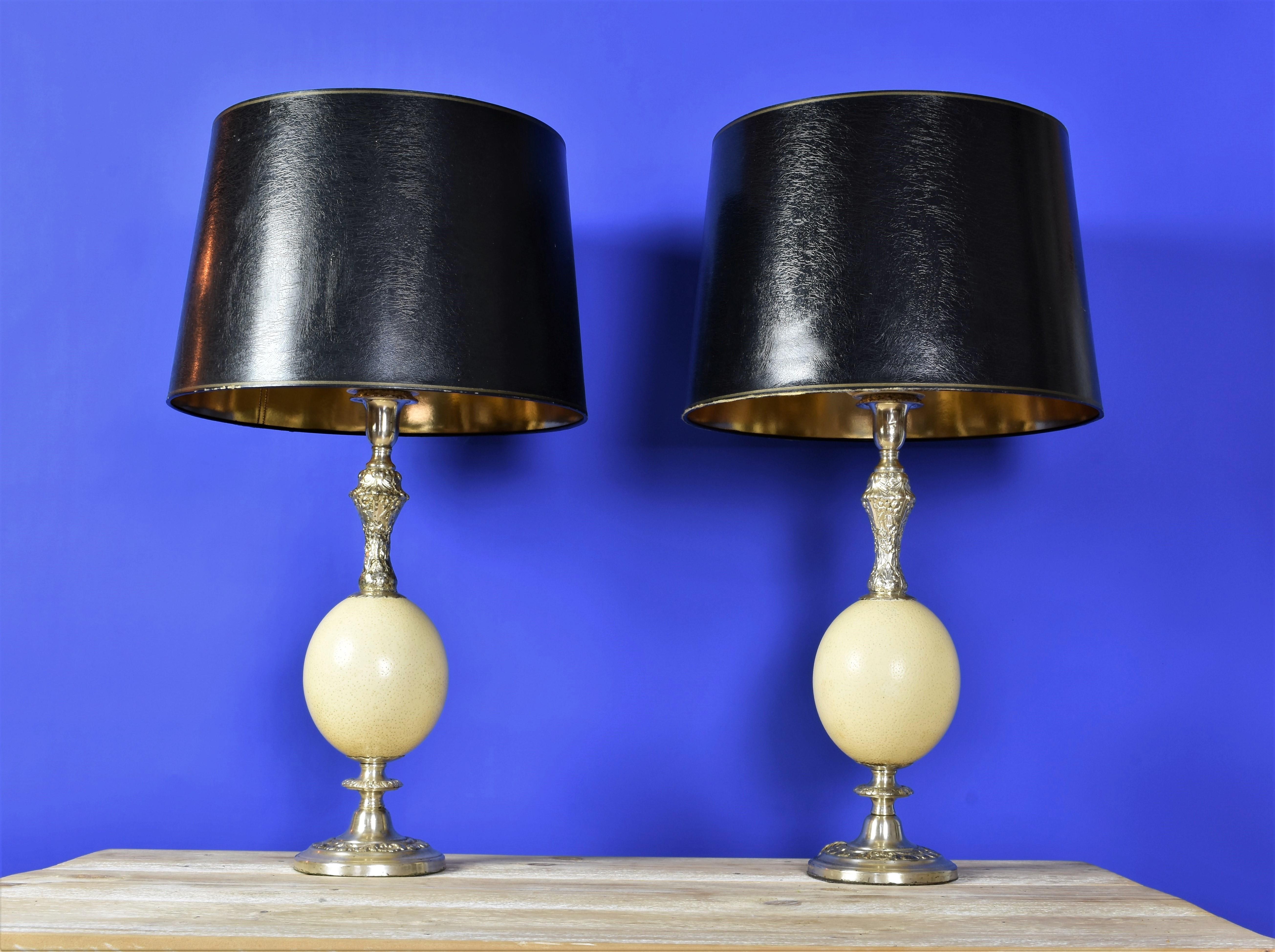 Very Classic and beautiful table lamps featuring a real ostrich egg. The shades are for display purpose only and not part of the sale.