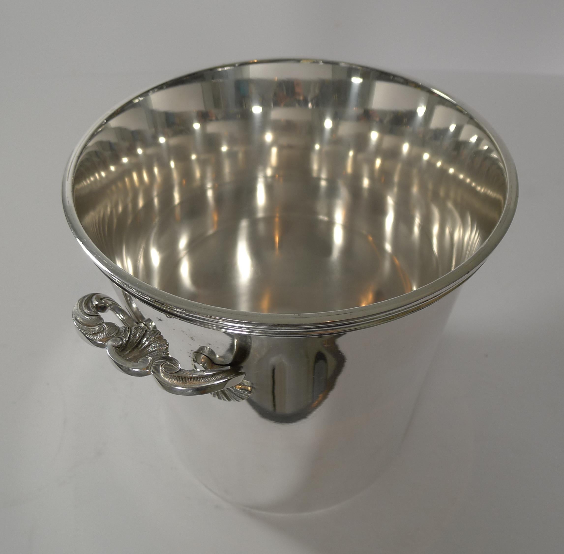 A fabulous vintage wine cooler or Champagne bucket, French in origin and dating to the 1930s or 1940s, a lovely quality piece with a good weight.

It has just returned to us from our silversmith's workshop where it has been professionally cleaned