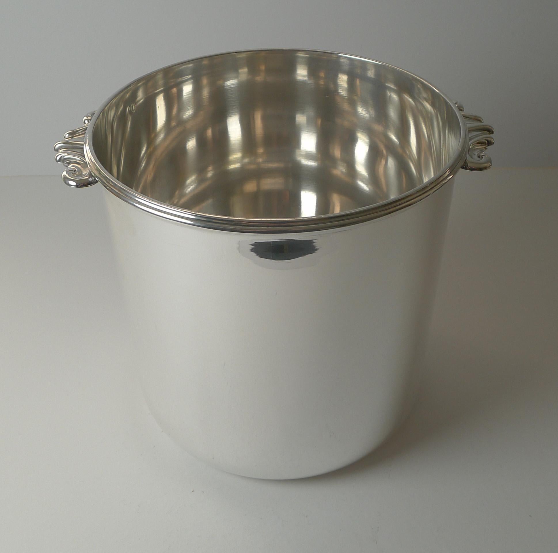 A very smart antique French Champagne bucket or wine cooler by the top-notch and highly collectable silversmith, Emile Puiforcat.

Just back from our silversmith's workshop, it has been professionally cleaned and polished, restoring it to it's