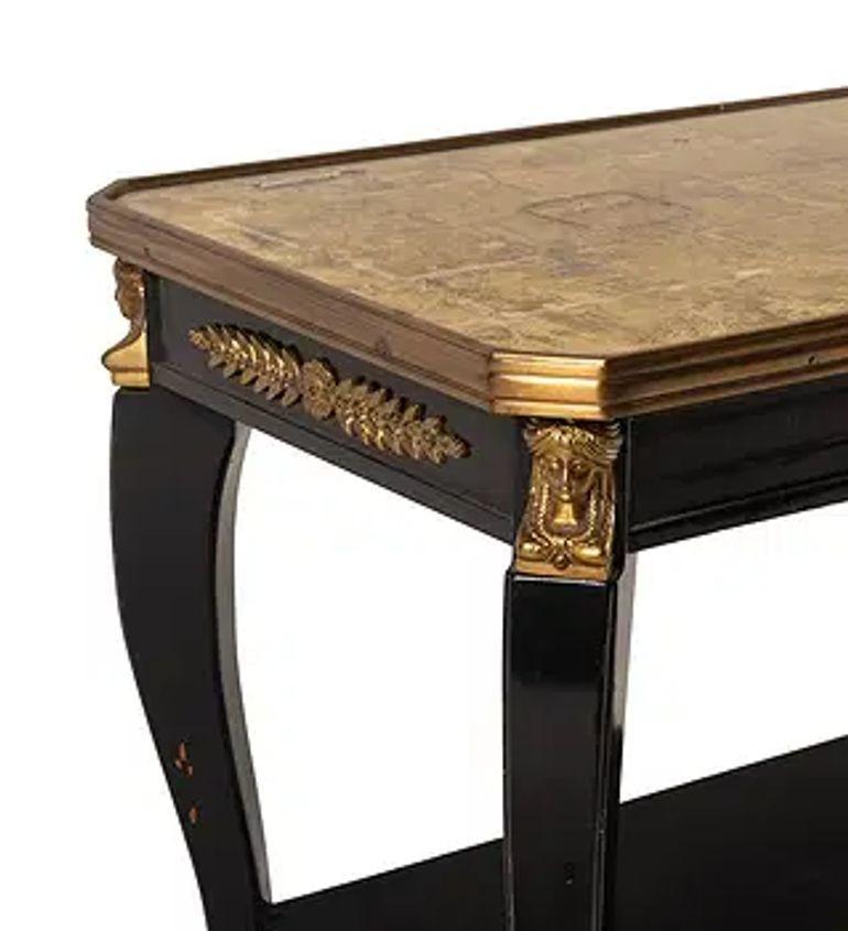 The Vintage French Stamped Maison Jansen Louis XVI Side Table is a stylish and elegant piece of furniture that exudes a retro charm. With its elegant design, this table suggests a sense of history and luxury. The Louis XVI model adds a touch of