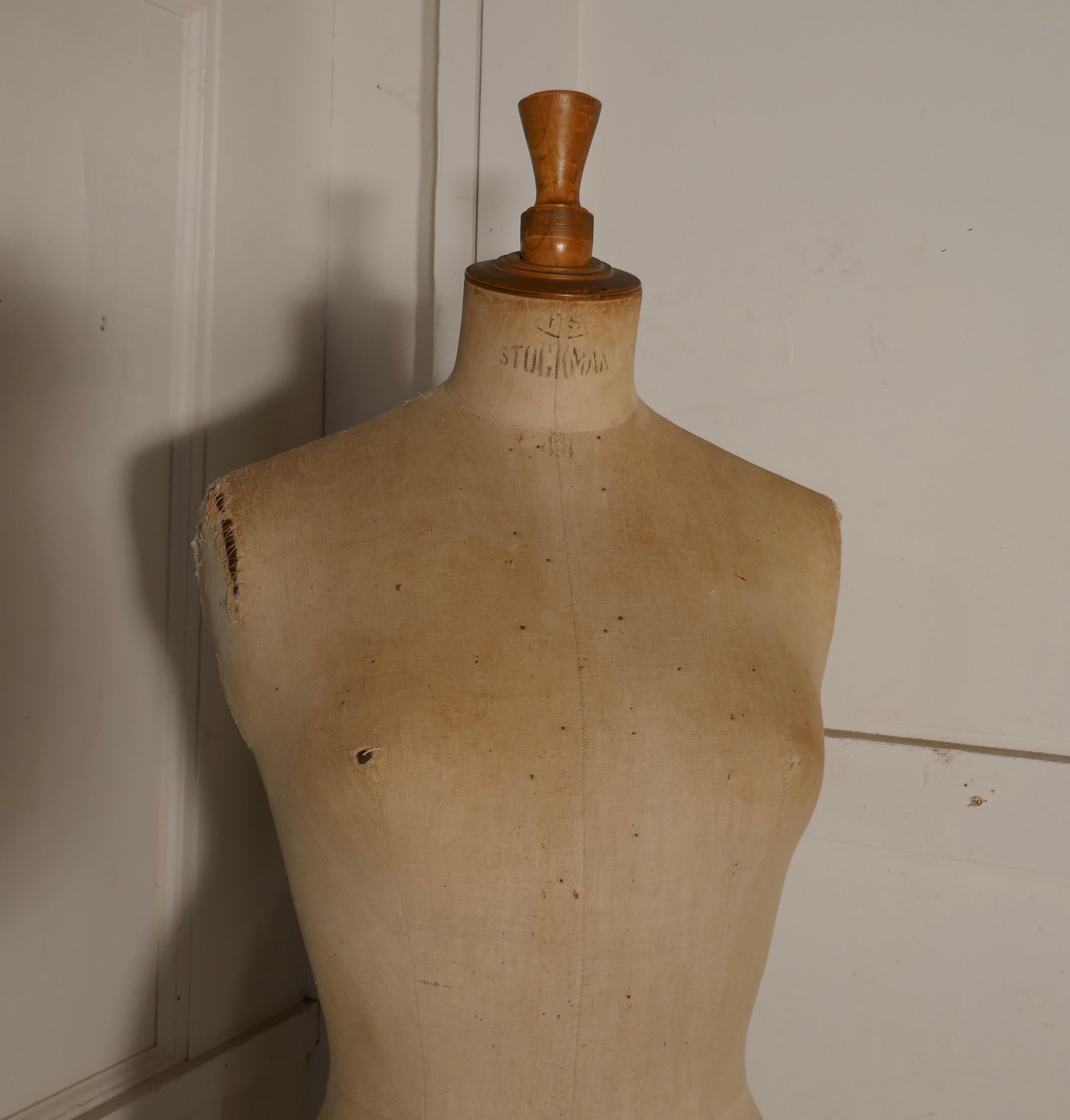 Vintage French Stockman Mannequin, English Size 14

The Mannequin or Tailors Dummy, dates from around 1900 made by  Stockman Paris our mannequin is in original condition, the age darkened linen is in fair condition, there are a few pin holes and one