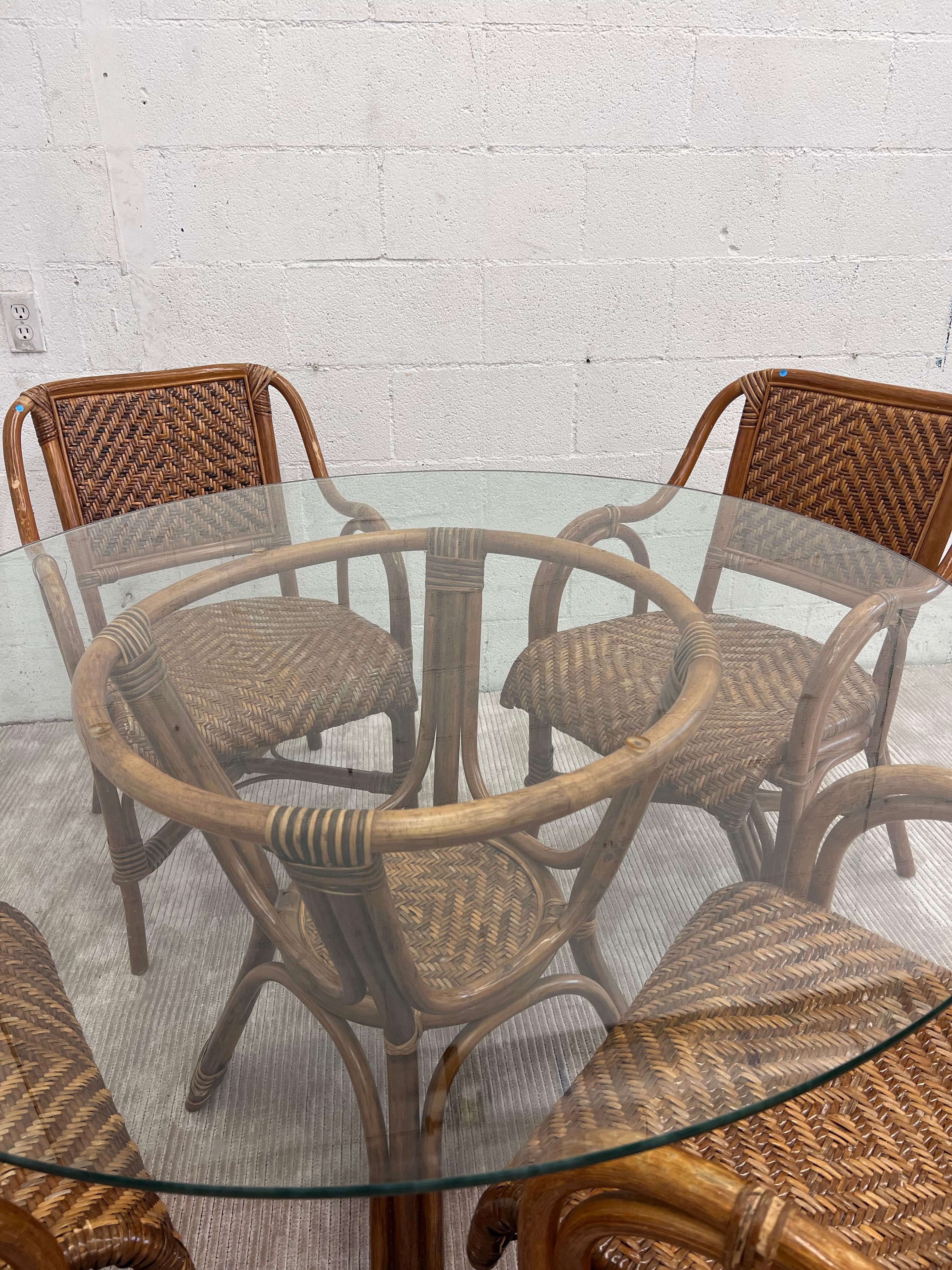 Vintage Bamboo Rattan Wicker Dining Table
Bamboo pedestal/center table. Organic whiplash curved bamboo. Created in the late 20th century. 

Matching chairs also available 