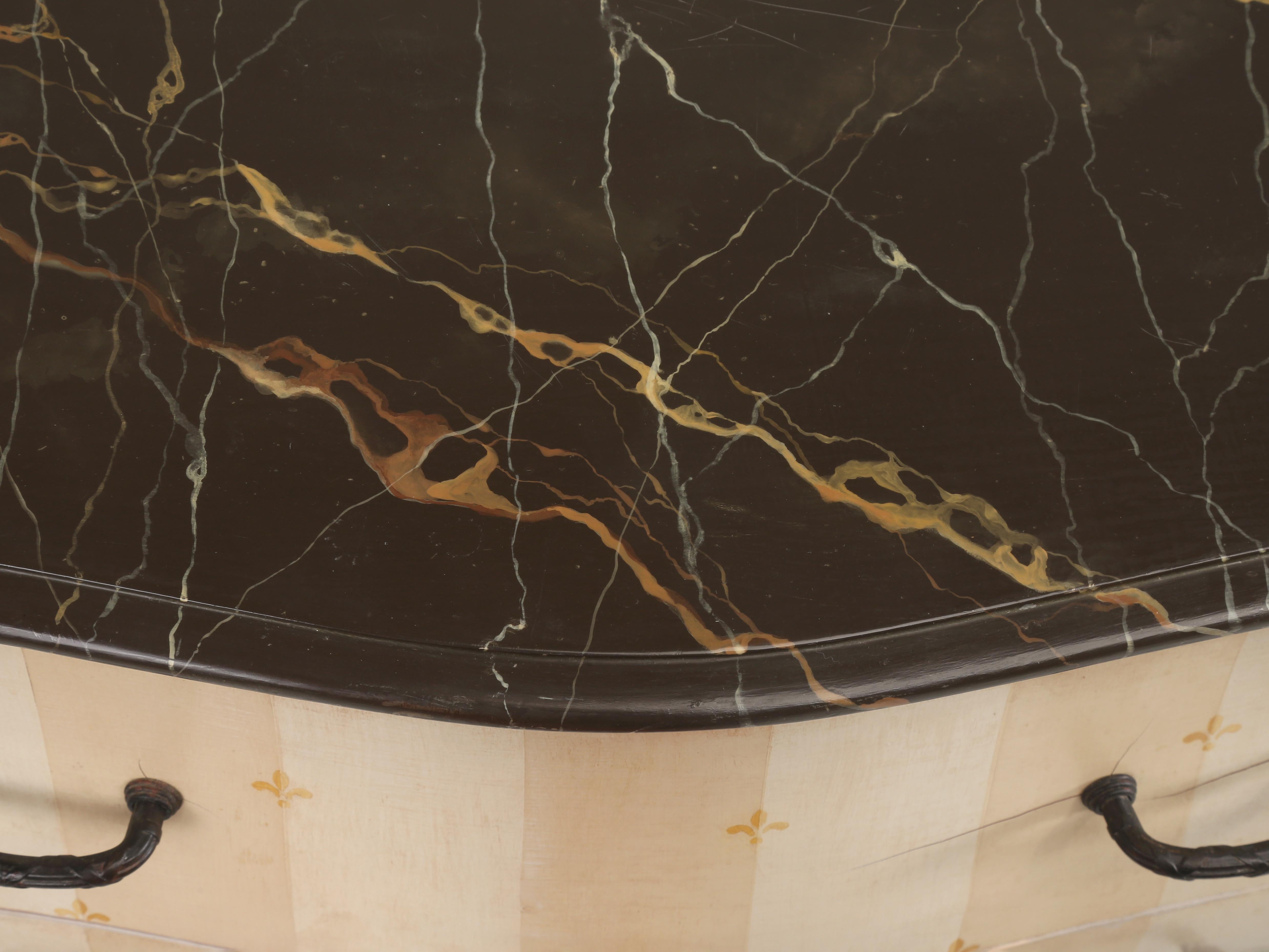 Late 20th Century Vintage French Style Bombé Commode with a Great Faux Marble Top and Aged Paint For Sale