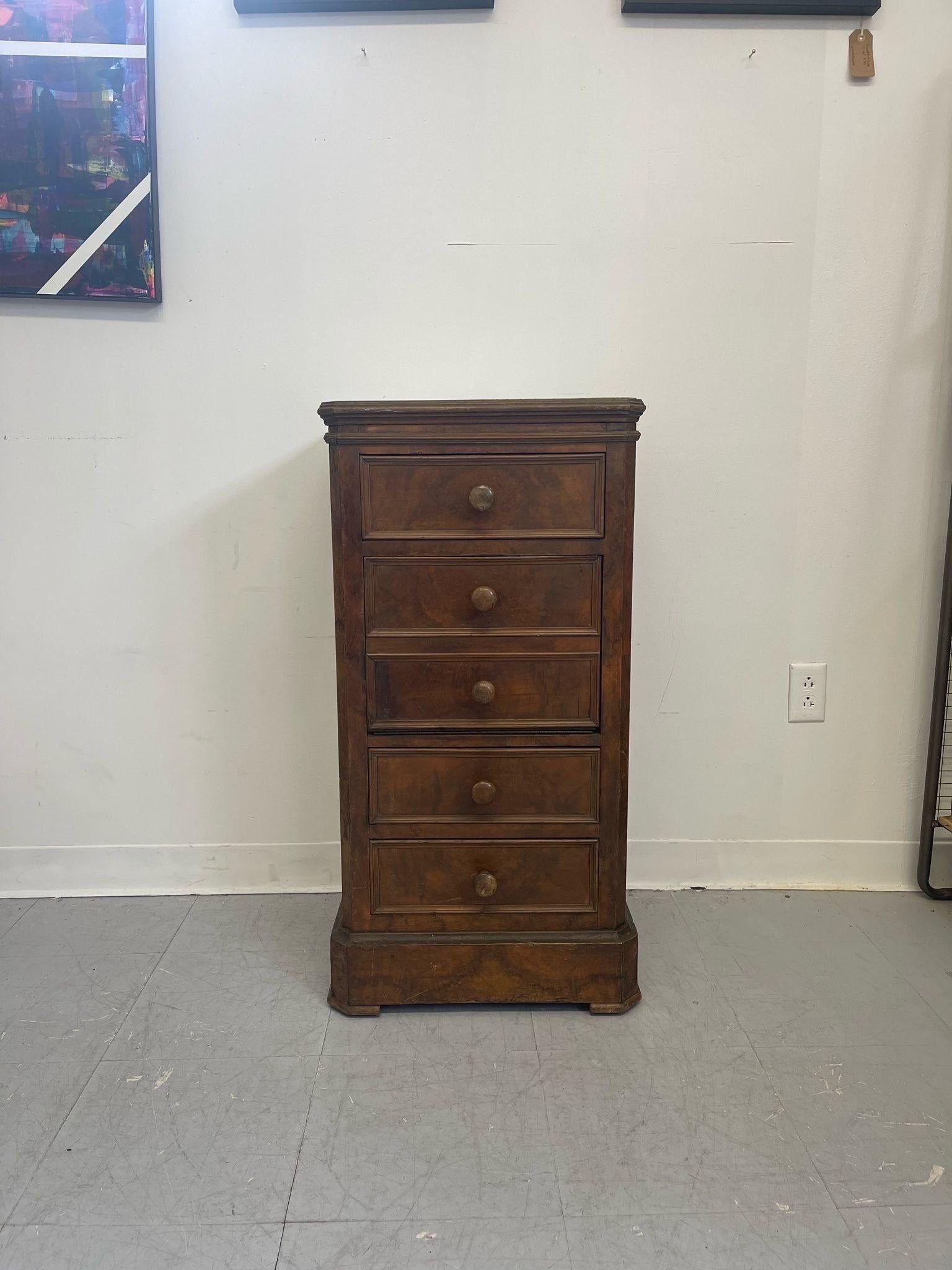 This Nightstand features 3 dovetailed drawers and 1 drop front cabinet space. Turned wood handles. Vintage Condition Consistent with Age as Pictured.

Dimensions. 18 W ; 16 D ; 36 H