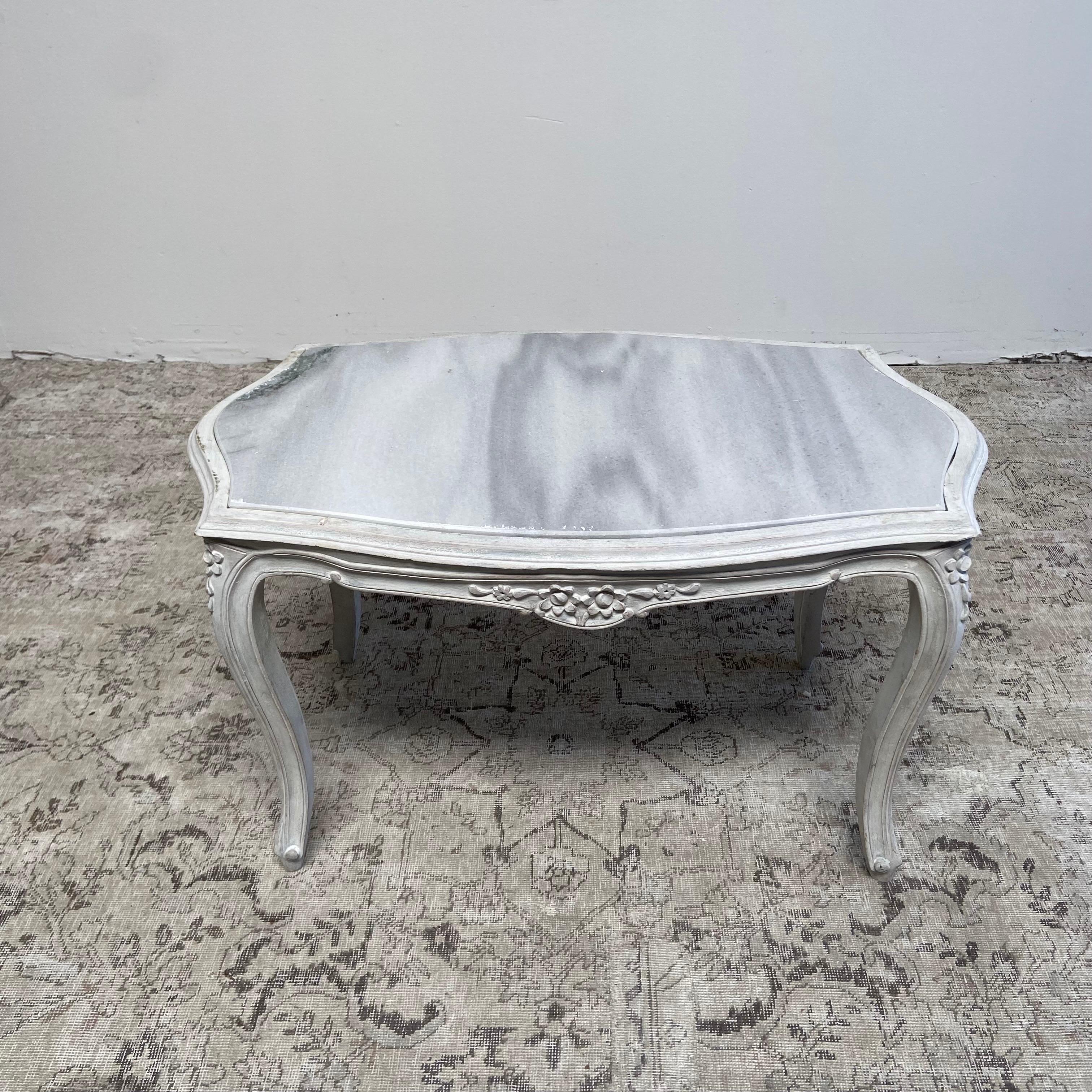 Vintage Marble top coffee table 38”w x 24”d x 22”h
Painted in a french gray color with subtle distressed edges, and antique patina.
Solid and sturdy, can be used on an everyday basis.
The marble top rests on the base, and is not attached.
If you