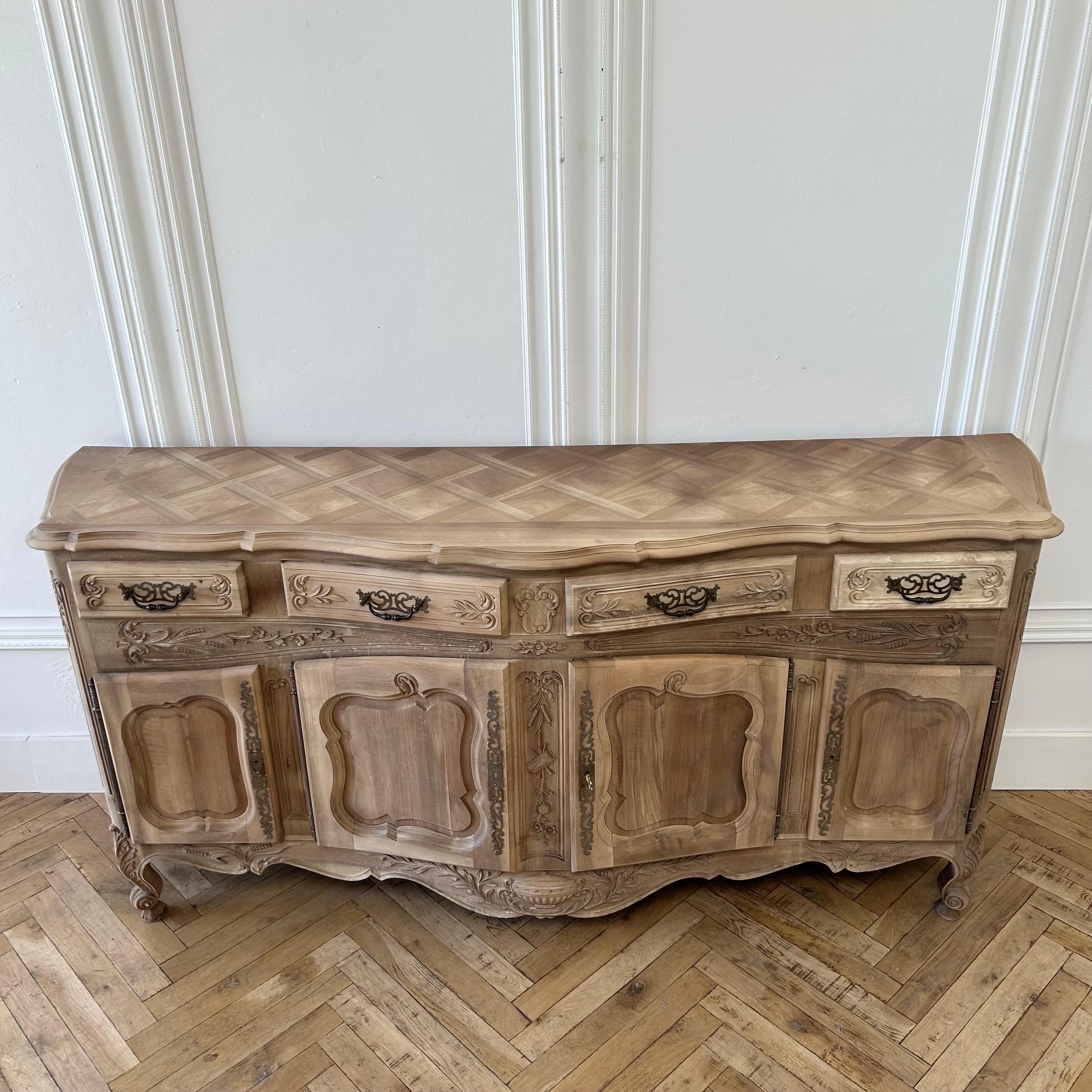 Oak sideboard 
Size 90”w x 24”d x 43”h
Beautiful vintage buffet with drawers and doors, plenty of storage.
Large grand size with beautiful parquet top. In a natural raw wood finish.