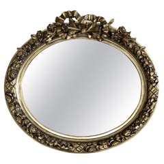 Specchio ovale in legno dorato in stile francese vintage con nastro e rose