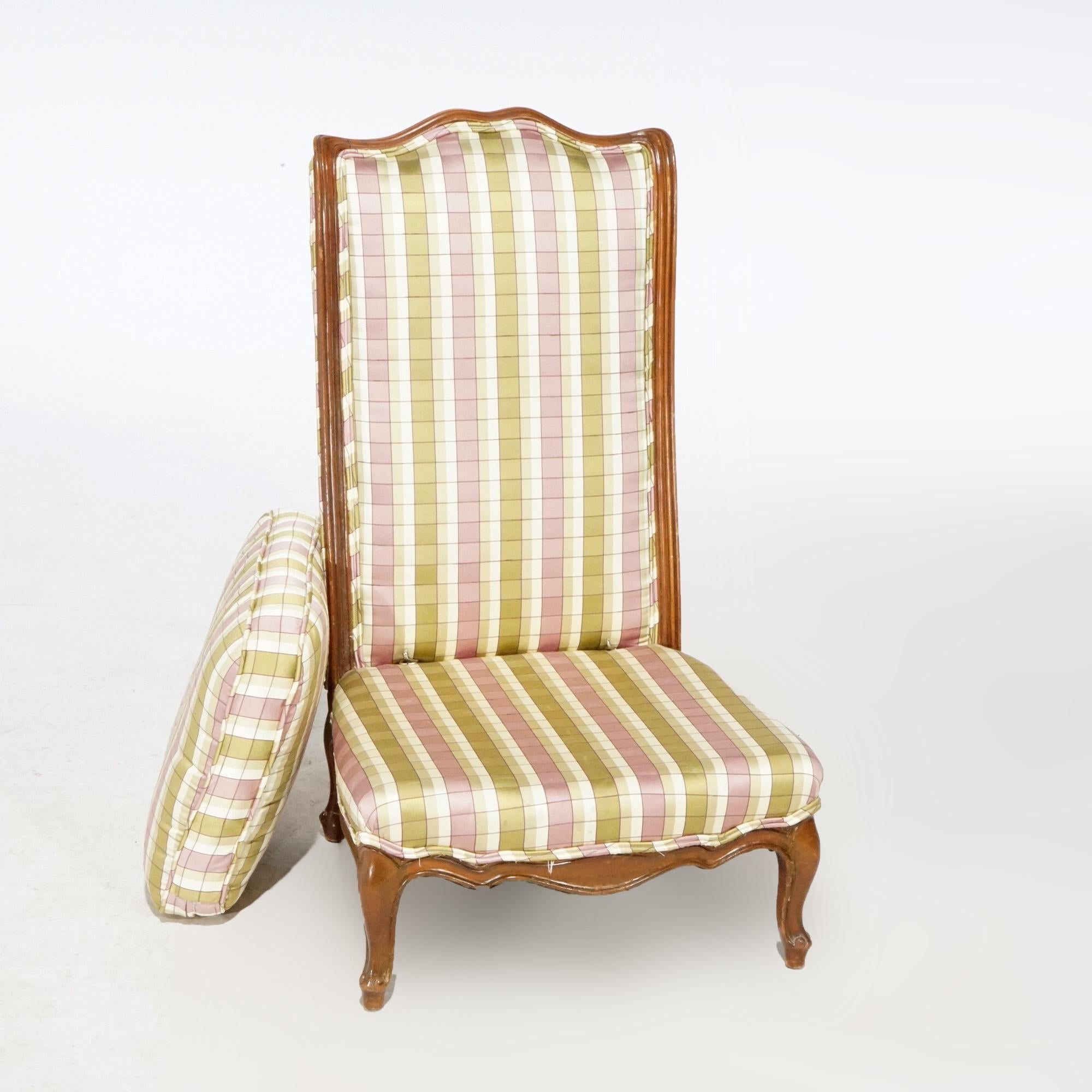 A vintage French style upholstered ladies slipper chair offers shaped back raised on cabriole legs, 20th century

Measures- 32.5''H x 20''W x 23''D.