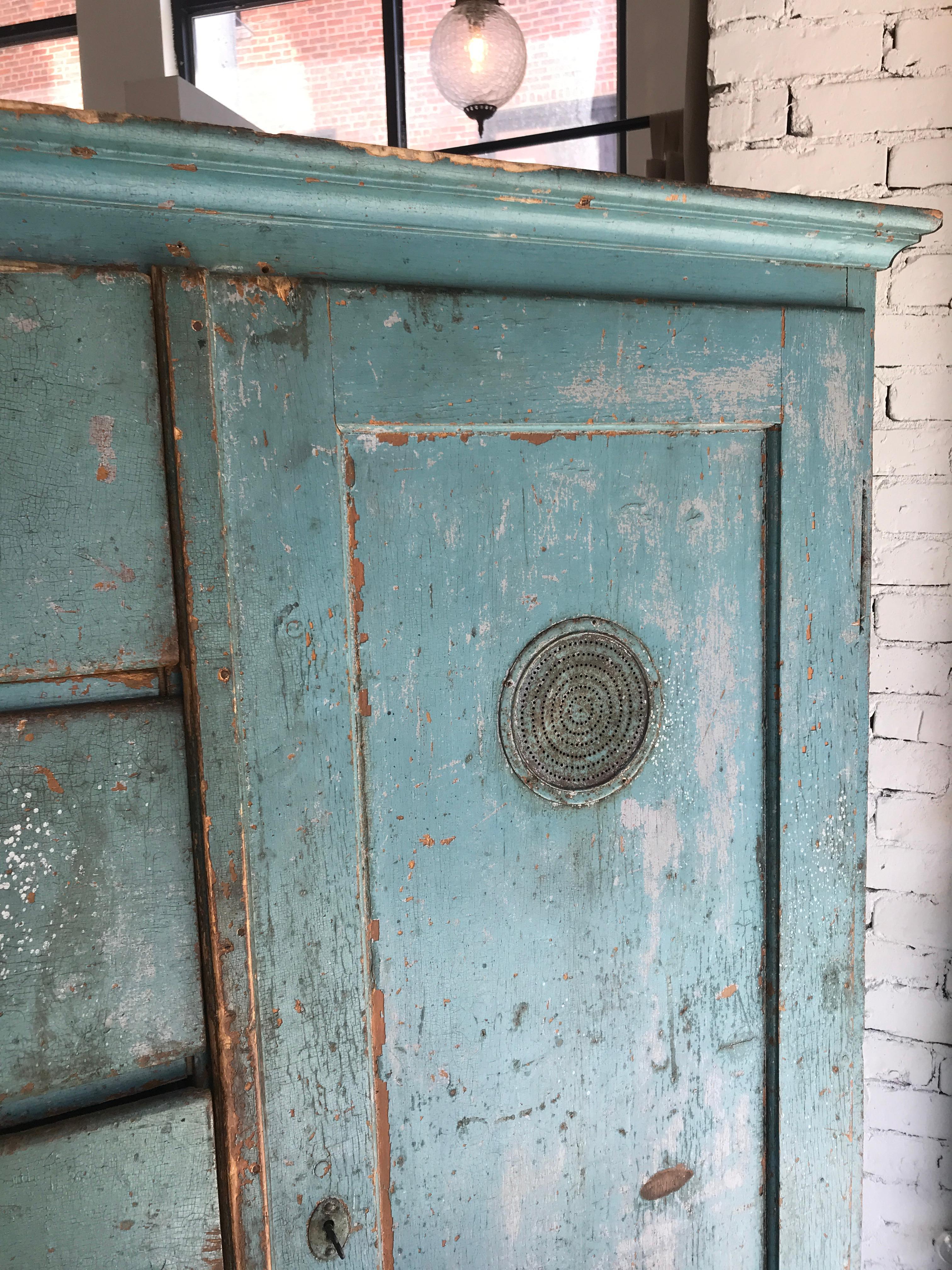 teal curio cabinet