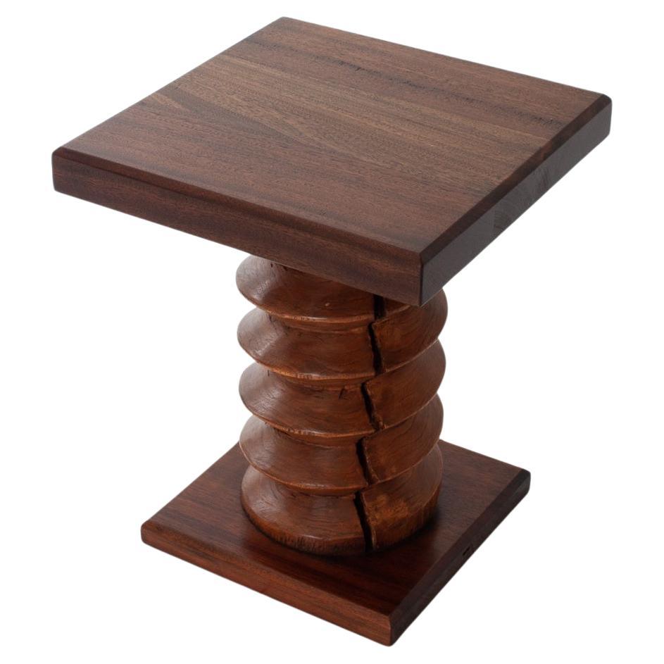 A French pedestal table with a turned column screw stem & square top & base, reminiscent of Charles Dudouyt designs.  The table form most probably dates from the 20th Century with the turned screw column from a much earlier date and most probably