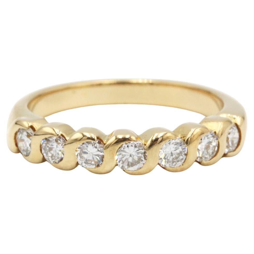 Bague d'éternité française torsadée en or jaune 18 carats avec diamants en vente