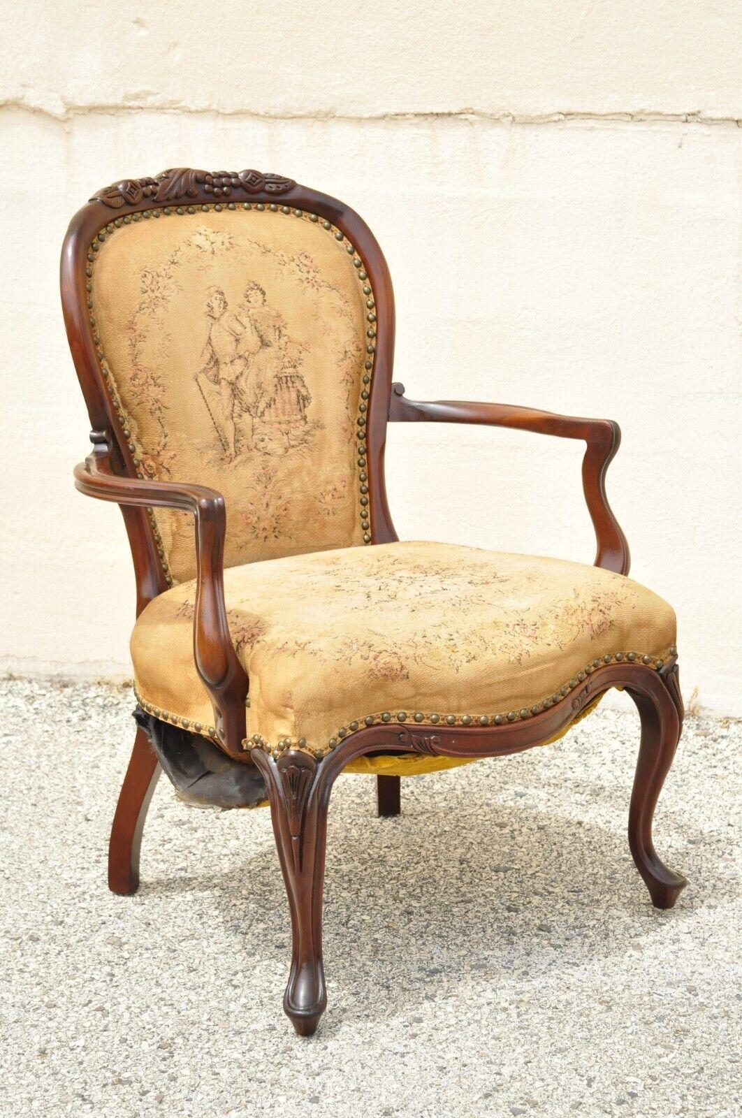 Vintage French Victorian Style carved mahogany frame lounge arm chair. Circa Mid 20th Century. Measurements: 35