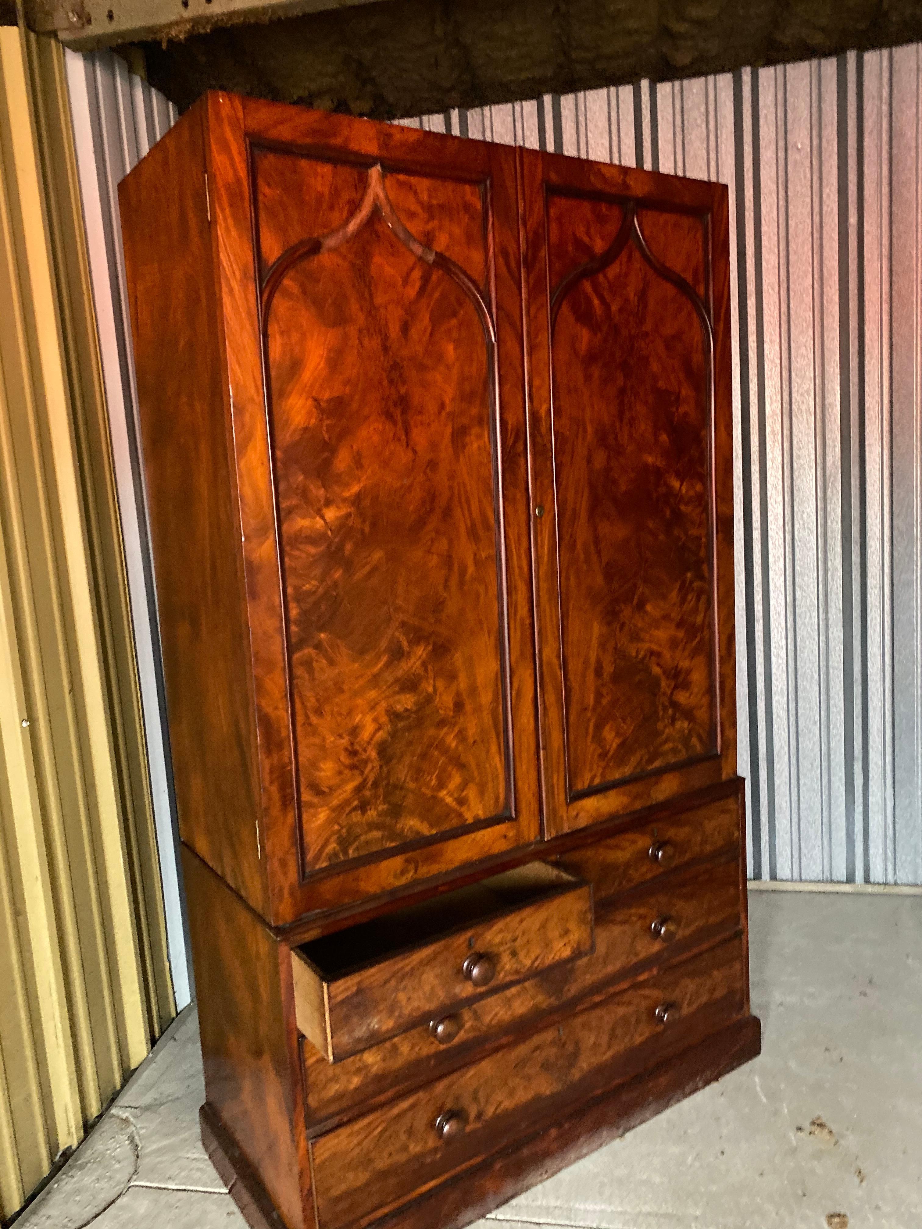 Gorgeous burled wood, This linen press or wardrobe has 4 deep drawers and 2 inside shelves .
Traditionally, a 'linen press' (or just press) is a cabinet, usually of woods such as oak, walnut or mahogany and designed for storing sheets, clothing,
