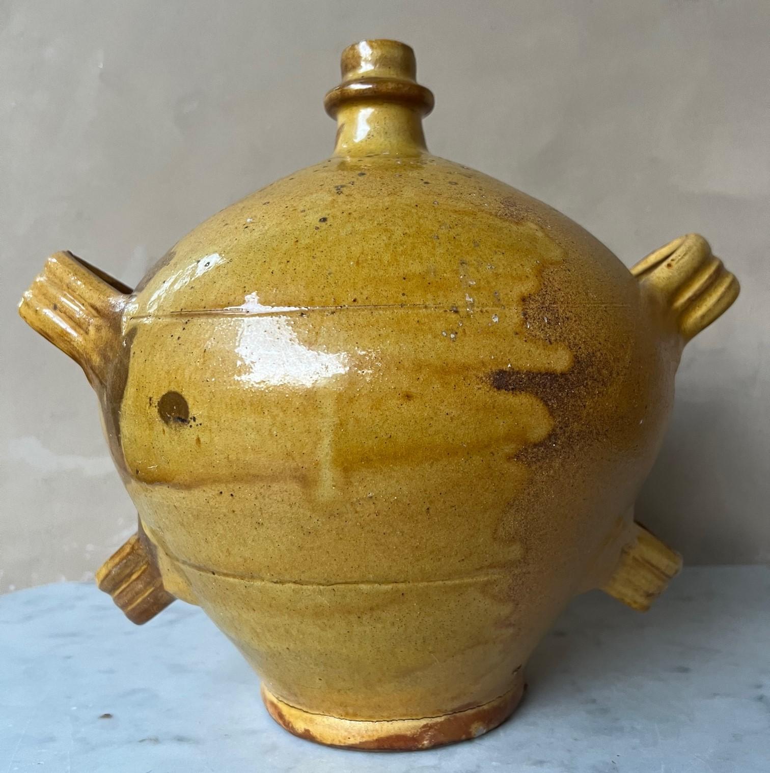 Vintage French mustard glazed water or wine jug, handmade with applied handles. These jugs are called Veritasse/Buret which means rare style. Jute rope was originally threaded through the handles to carry the jug.