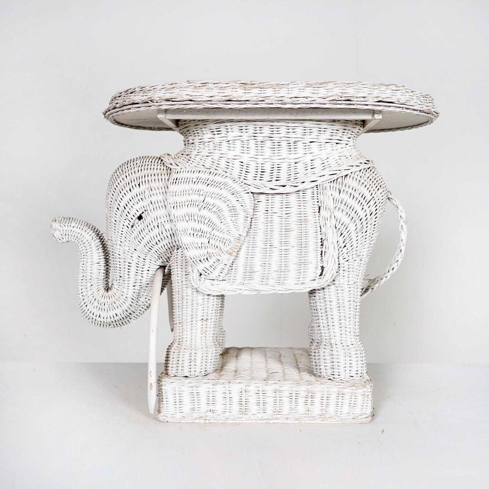 An original vintage wicker elephant table with removable tray.

Can be used as a coffee table or fun little side table.

Condition 
Please do take a careful look at all our pictures and note that these are antique or vintage pieces that will show