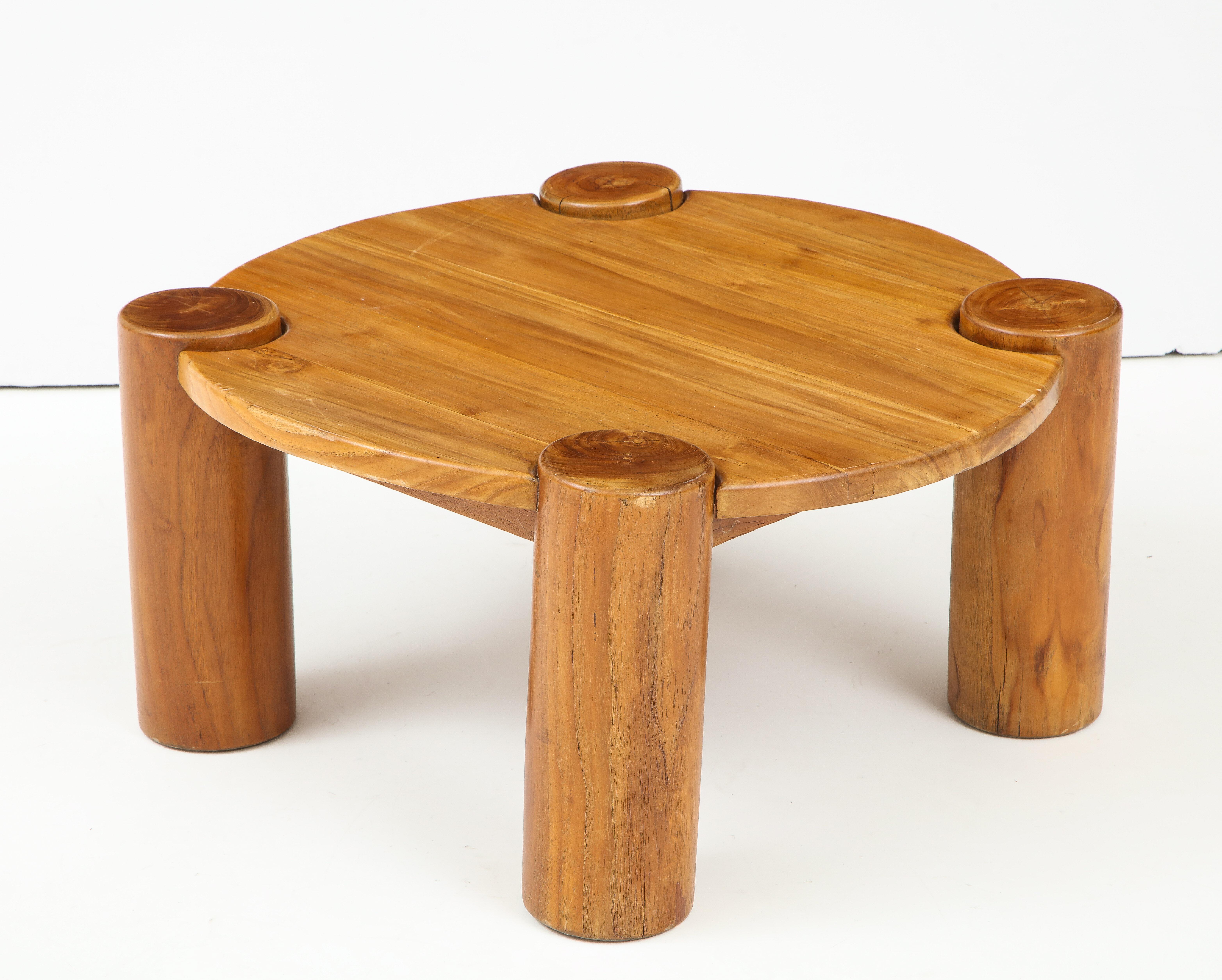 Vintage wood table with cylindrical legs, France, circa 1950s. In the style of Charlotte Perriand.