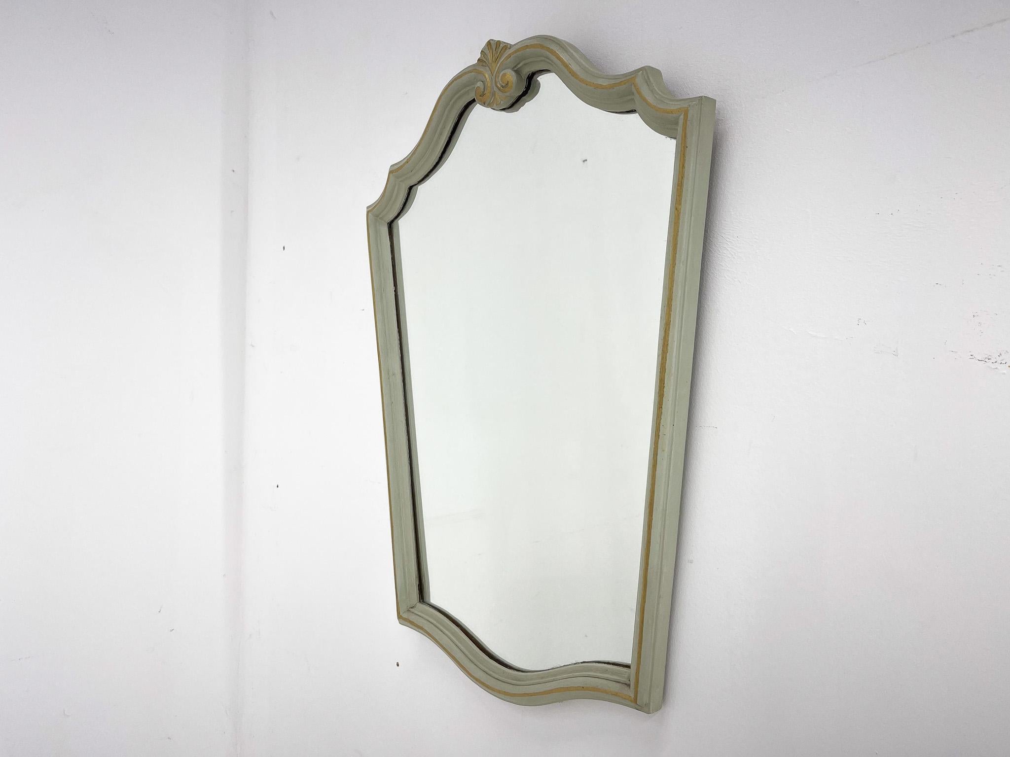 Mid-century wooden mirror from France with original paint.