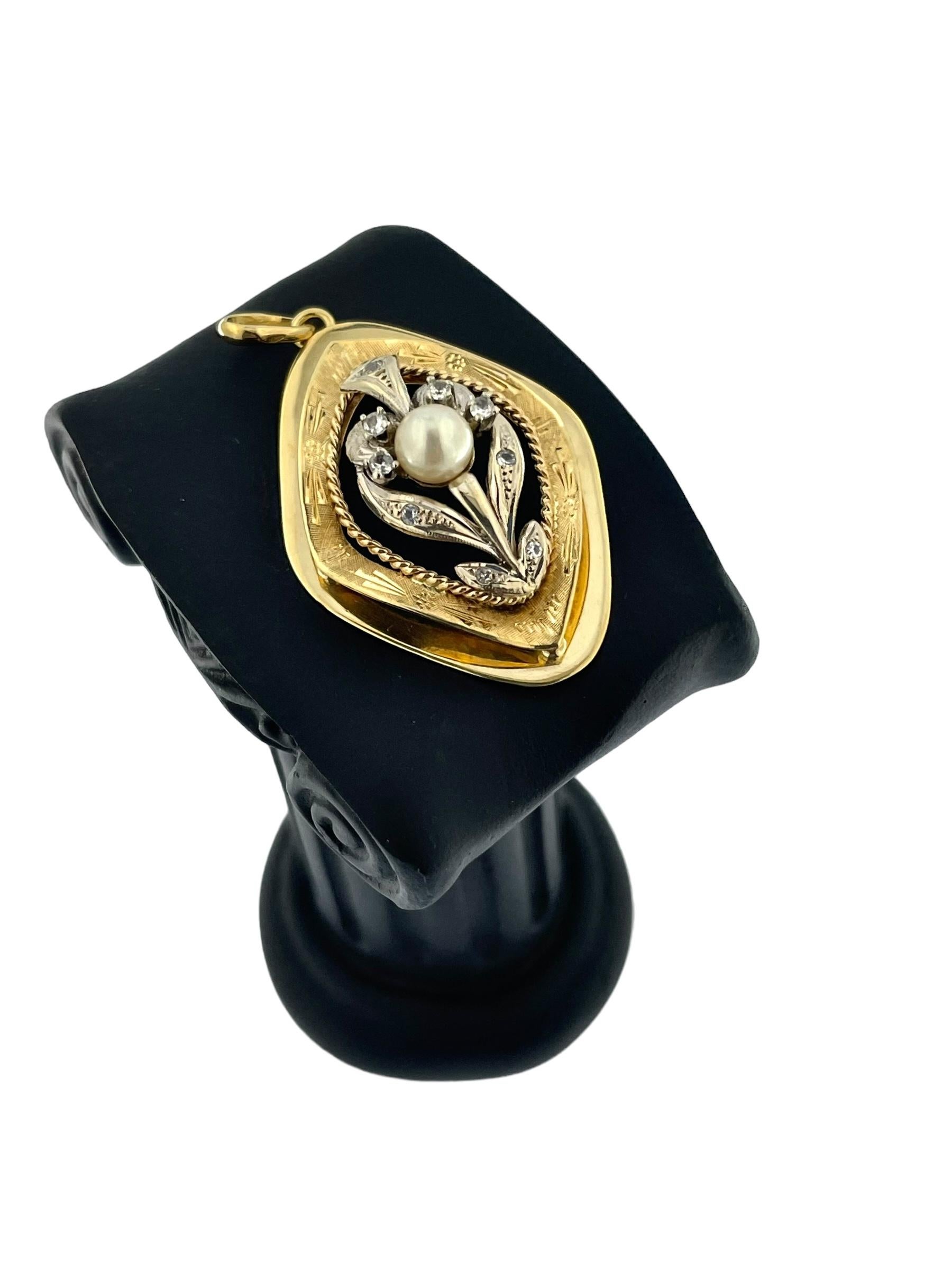 The Vintage French Yellow and White Gold Pendant is a refined and exquisite piece, crafted in 18kt yellow and white gold and showcasing a delicate flower design. This pendant features a central white pearl set in the middle, surrounded by white gold